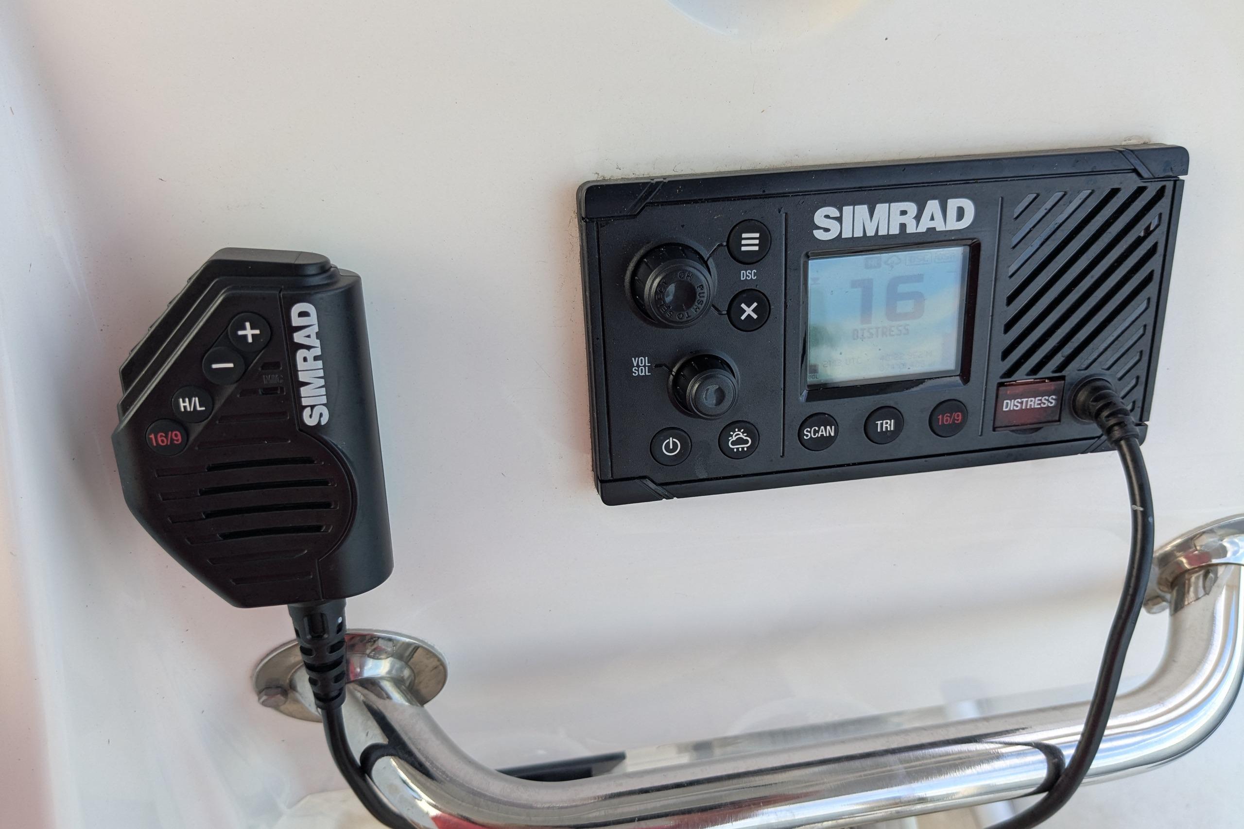 Simrad marine radio system on a 2016 Brig E780 boat dashboard.