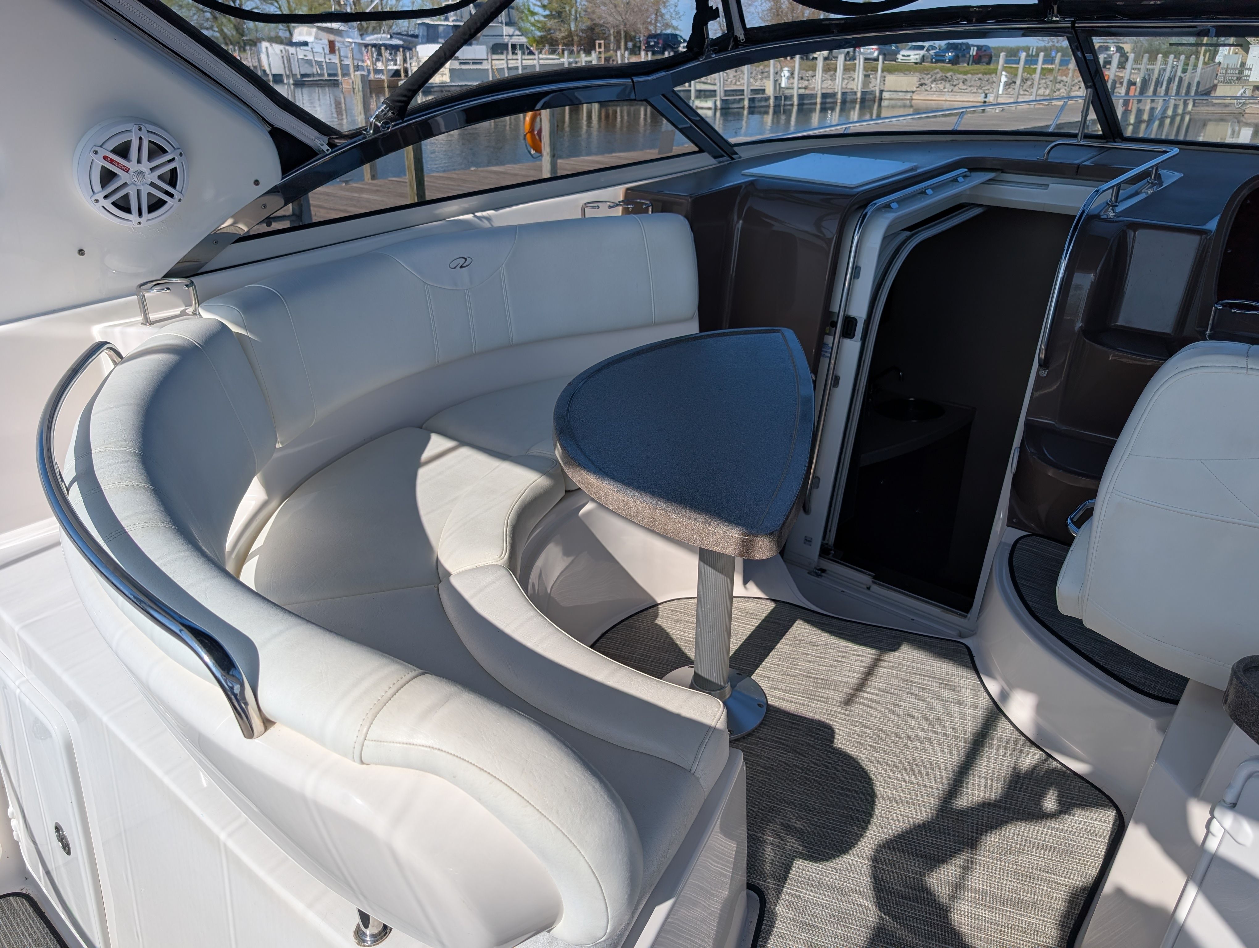 Interior of a 2005 Regal Commodore 3560 yacht with white seating area.