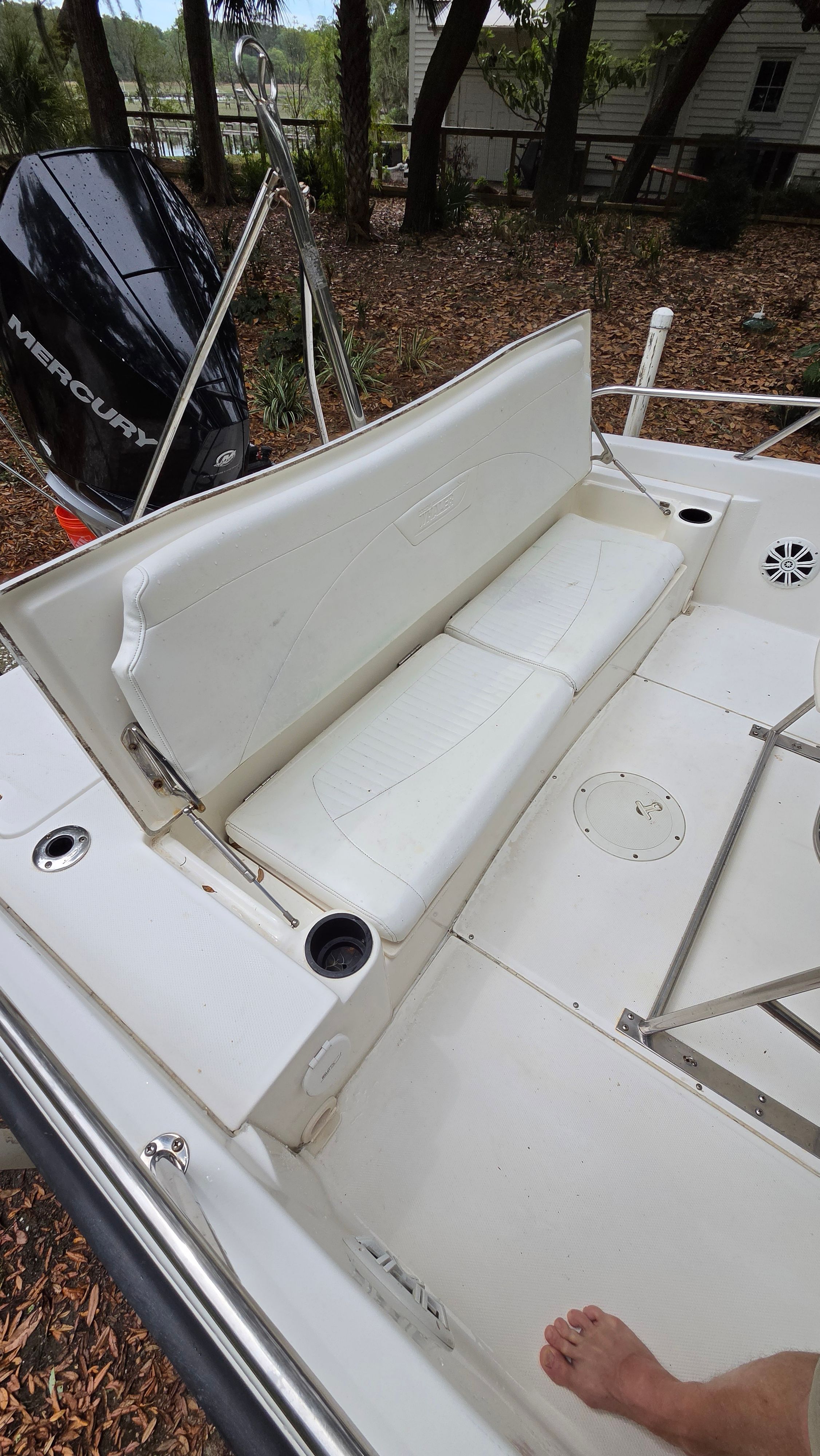 The image shows the white seating area of a 2008 Boston Whaler 230 Dauntless boat.