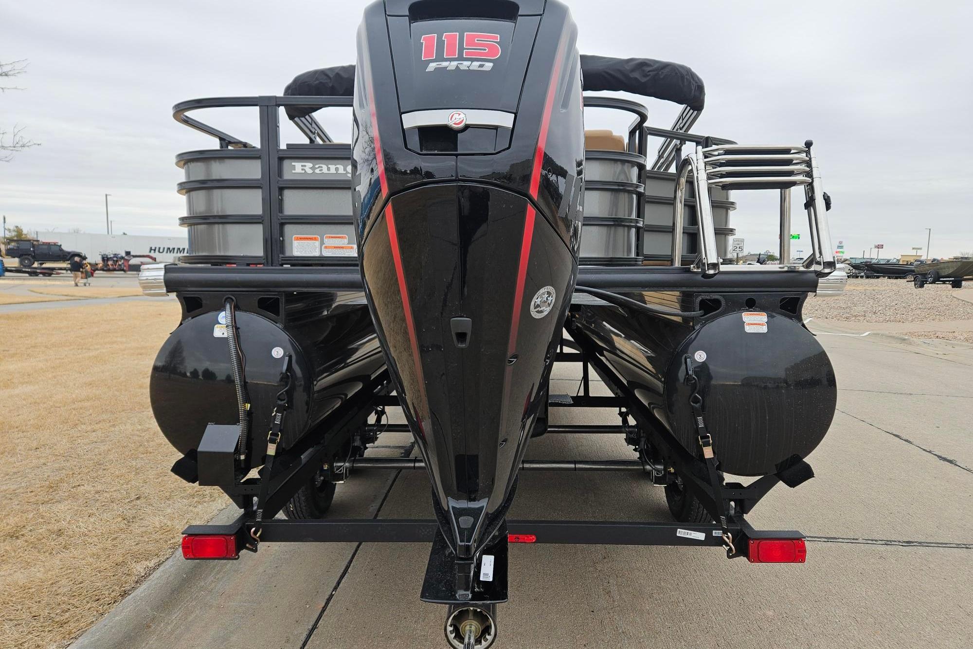 2026 Ranger 220F boat with 115 Pro motor, rear view on trailer.