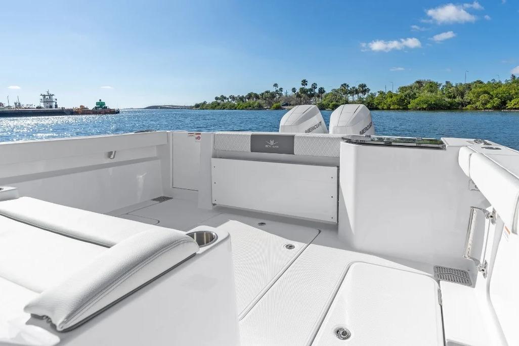 Manufacturer Provided Image: 2026 Bertram 34 CC boat interior with twin Mercury engines on a sunny day.