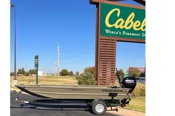 2026 Tracker Grizzly 1654 T Sportsman boat at Cabela's outdoor store.