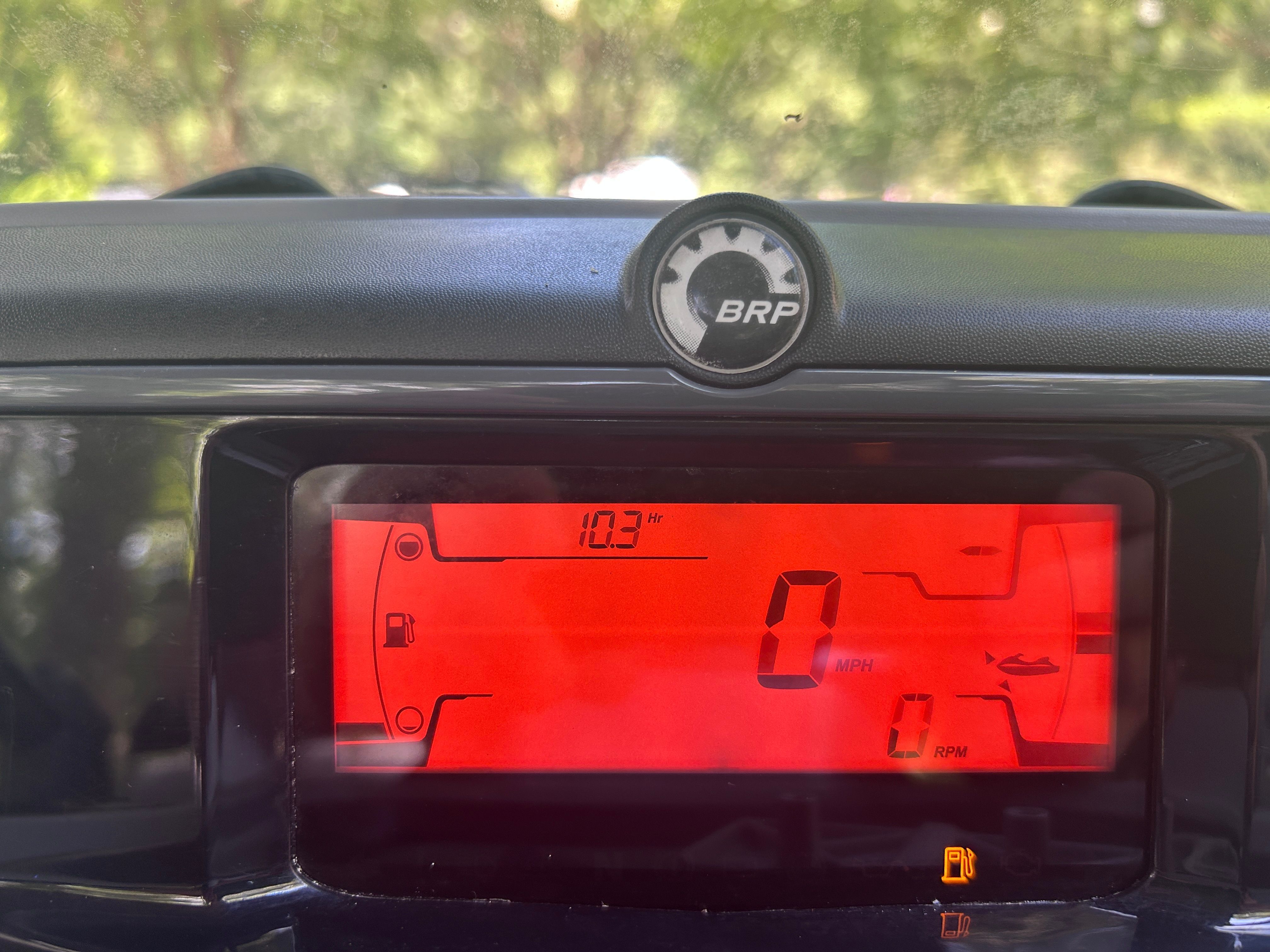 Dashboard of a 2023 Bombardier Switch with digital display and BRP logo.