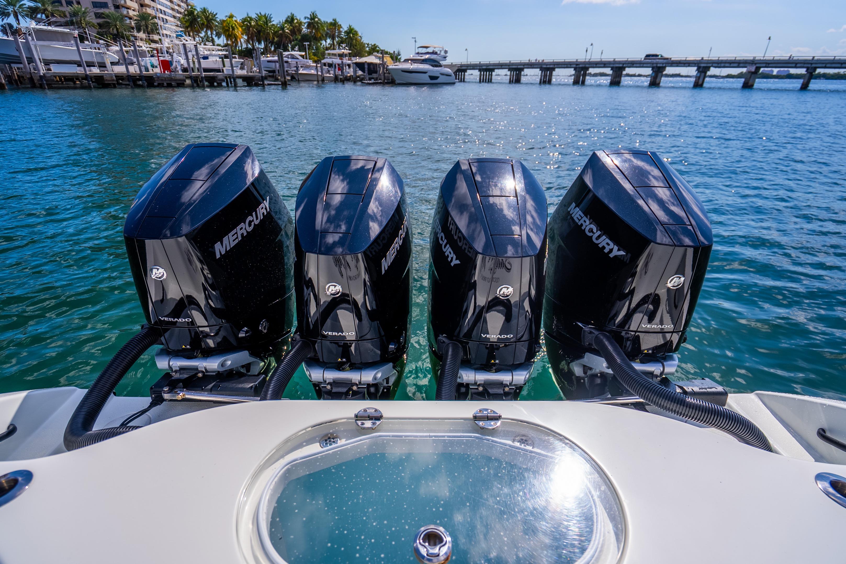 2024 Yellowfin 39 Offshore boat with four Mercury Verado engines docked by the water.
