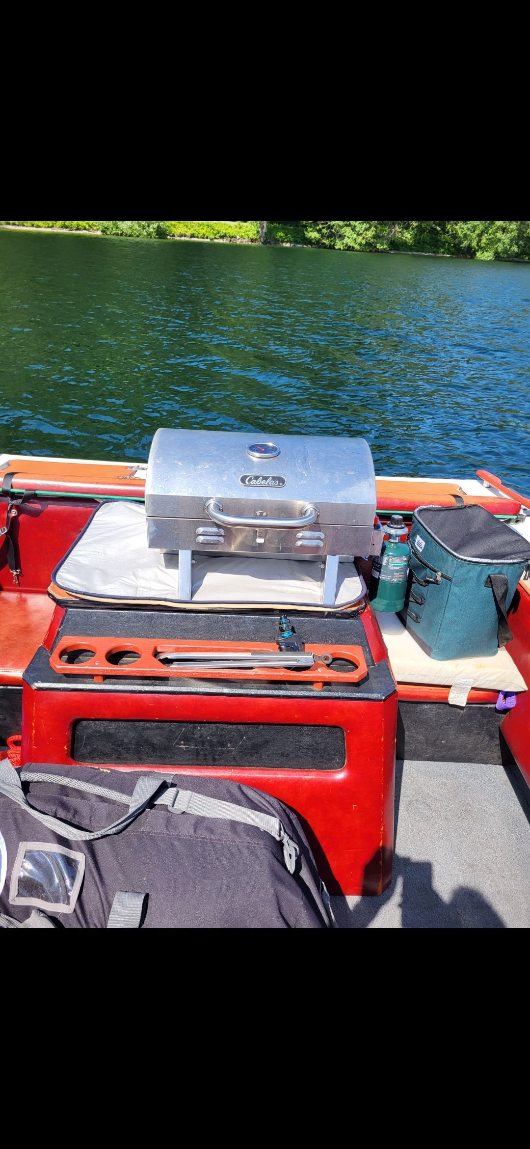 Grill on a 1977 Bayliner Jamaica boat on a lake.