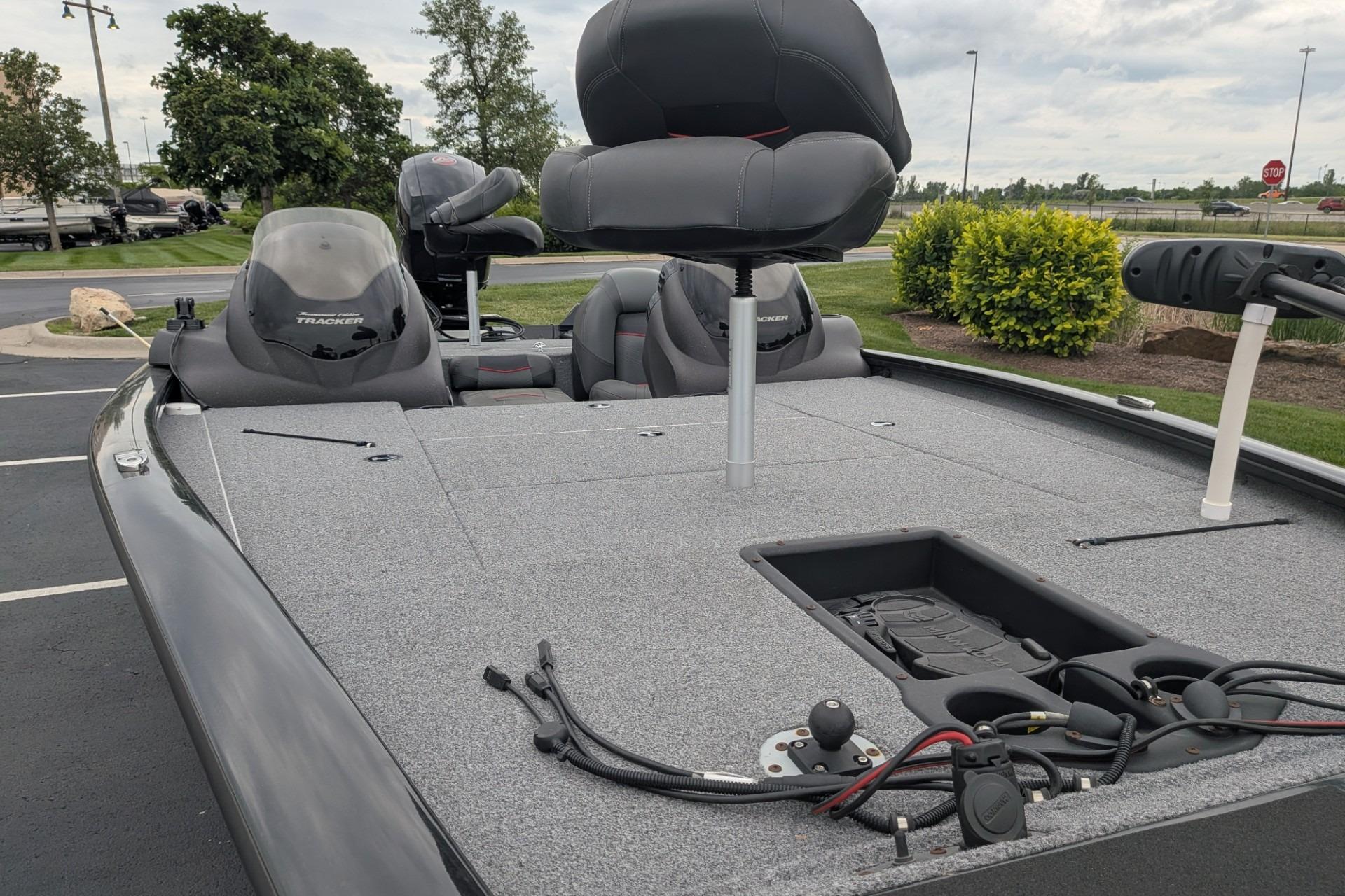 2023 Tracker Pro Team 195 TXW Tournament Edition boat with seating and fishing deck.