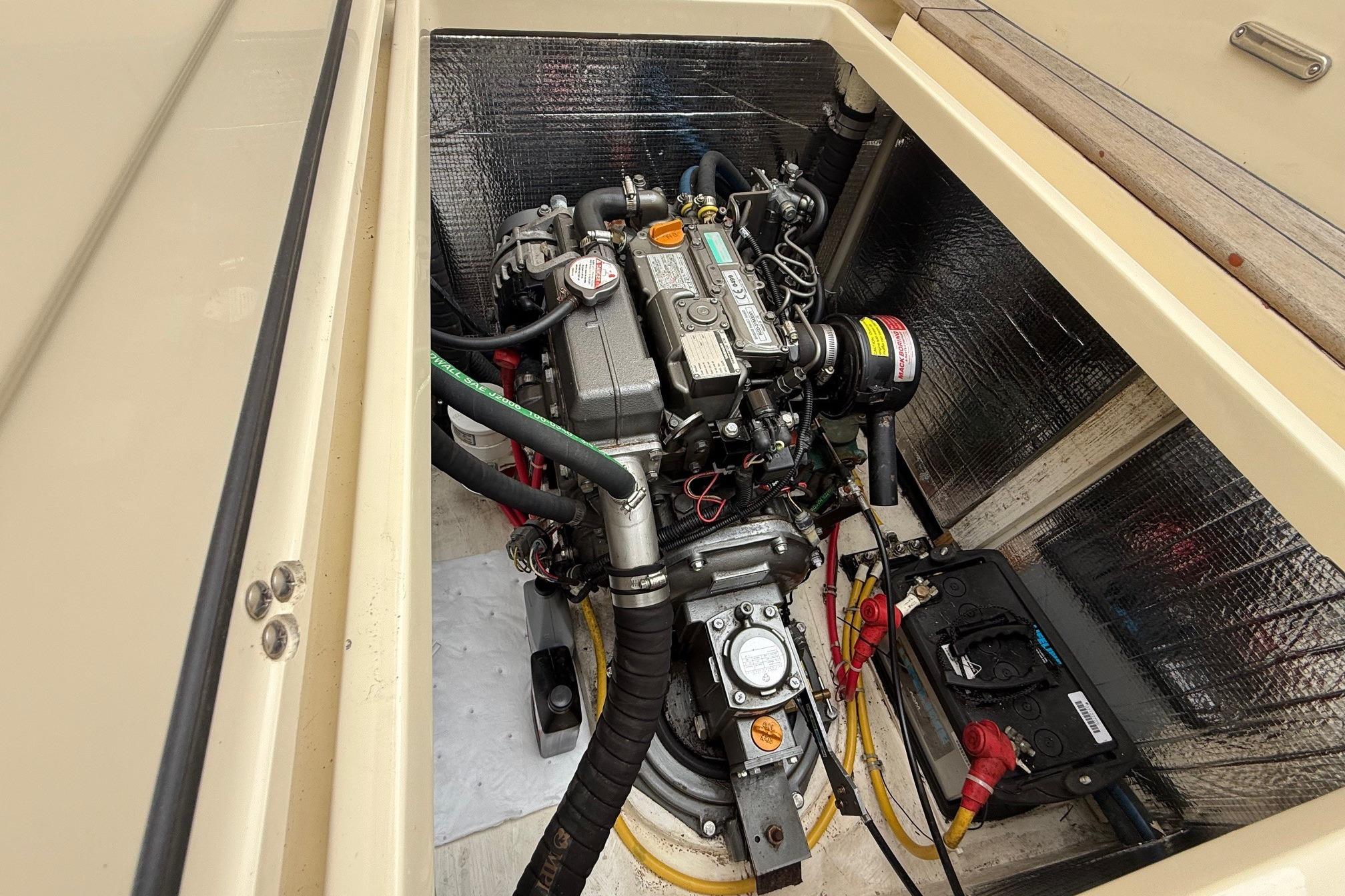Engine compartment of 2015 Hinckley DS 42 boat, showcasing detailed mechanical components.