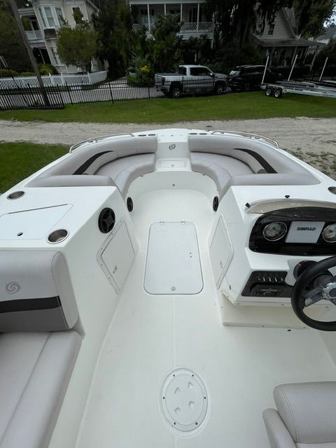 The image shows the cockpit of a 2018 Hurricane SS188 boat with seating and a helm console.
