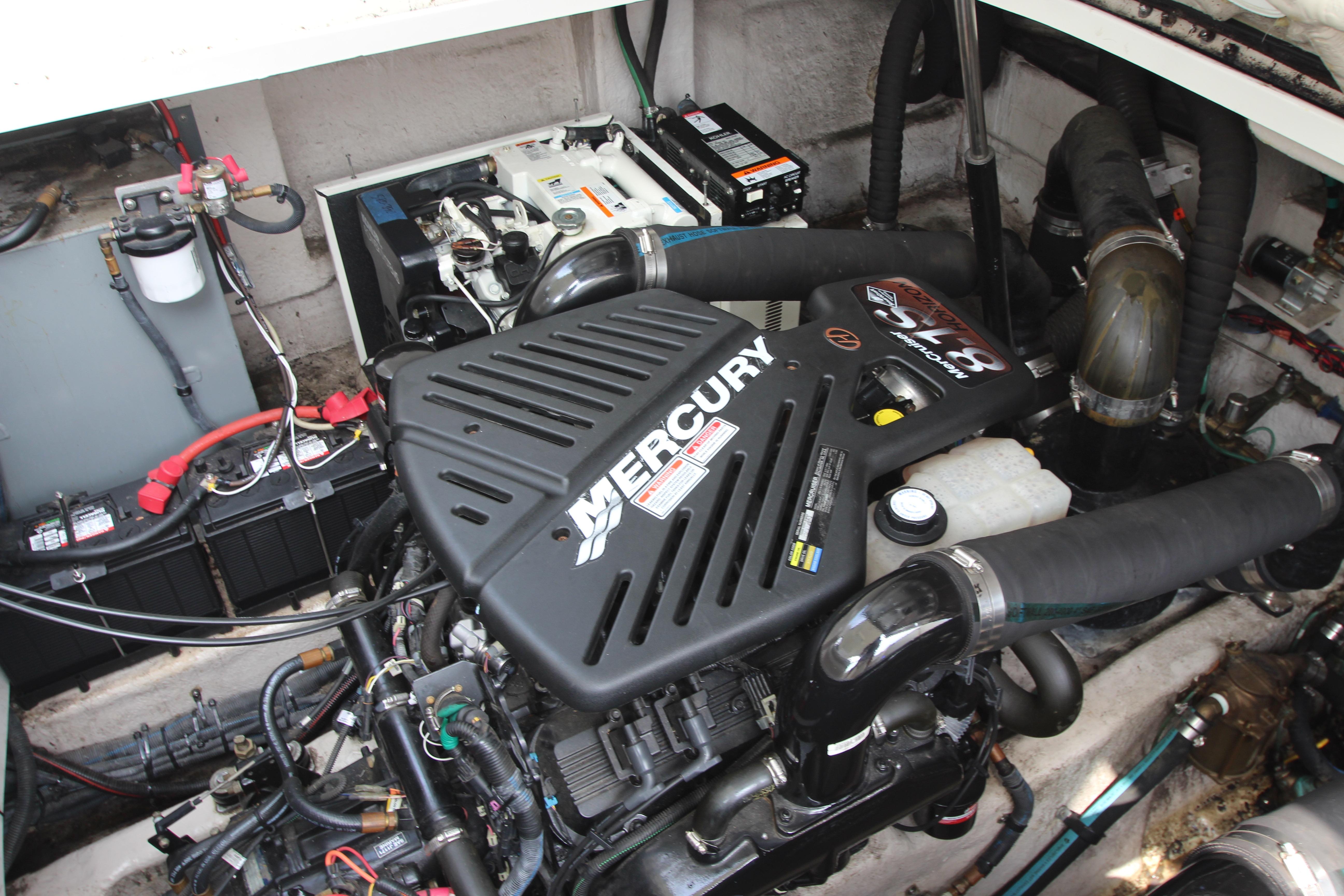 Engine compartment of a 2004 Sea Ray 40 Sundancer with Mercury engine components.