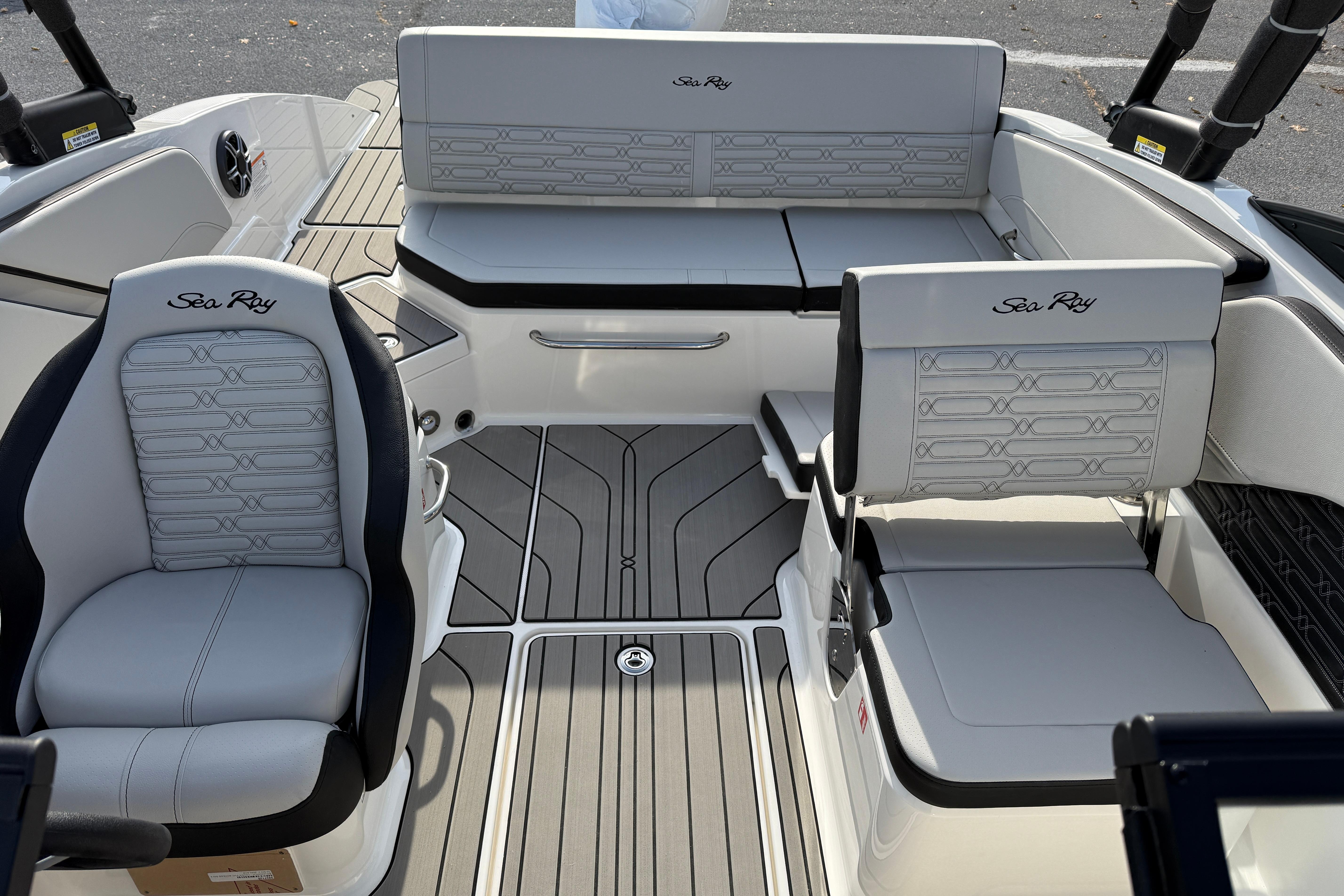 2026 Sea Ray SPX 210 Outboard interior with stylish seating and modern design.