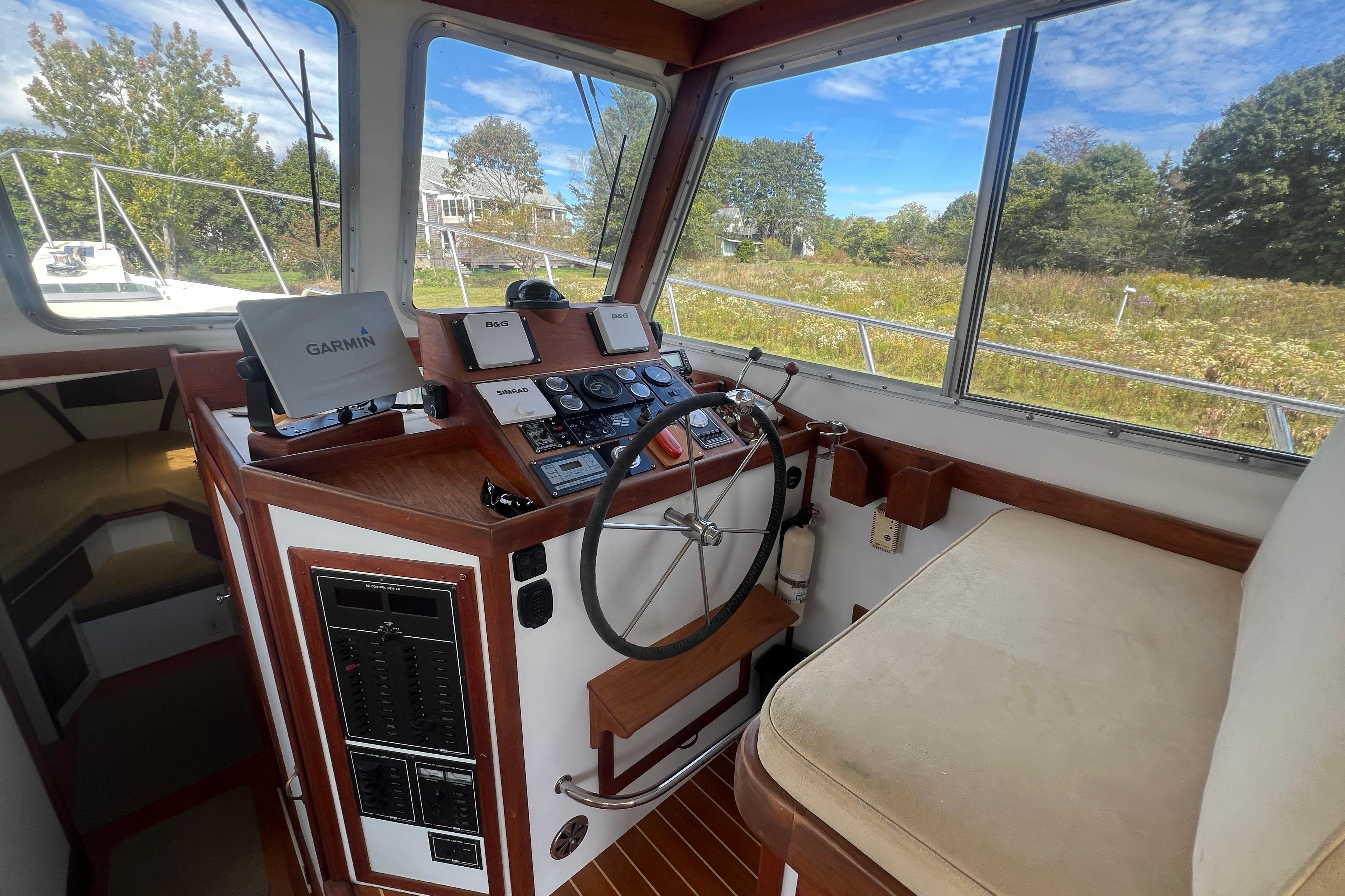Cockpit of 1994 Zimmerman Marine Z36 Sedan Cruiser with Garmin navigation system.
