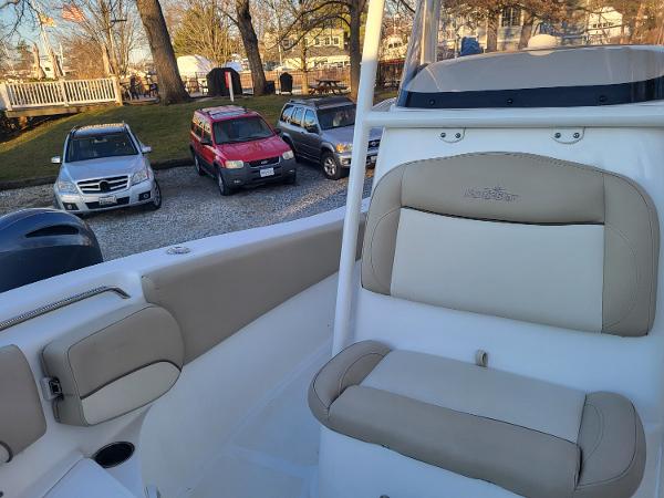 2021 NauticStar 2302 Legacy boat interior with beige seating.