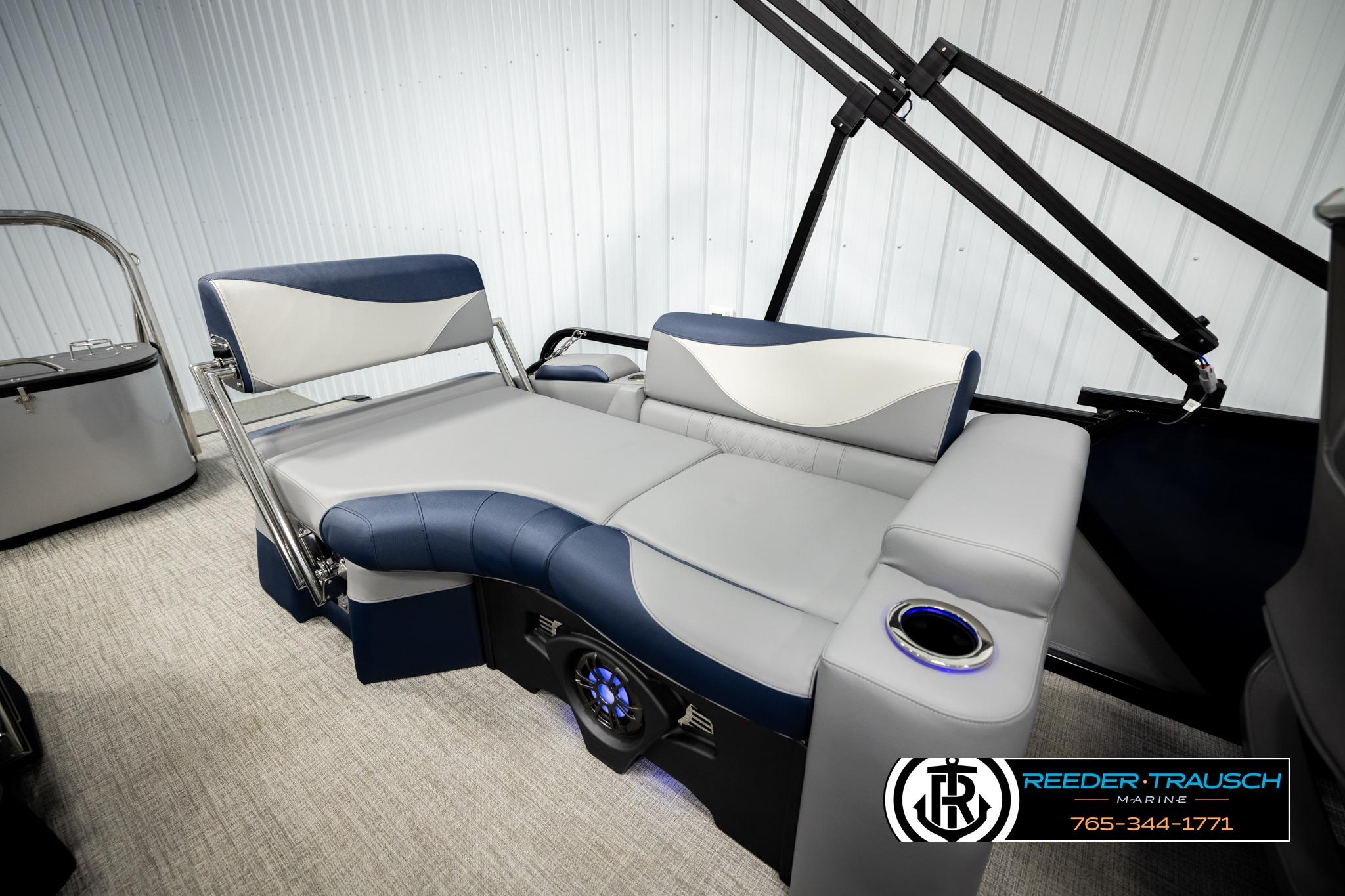 2026 Avalon LSZ QLS boat interior with luxurious seating and cup holder, showcased by Reeder-Trausch Marine.
