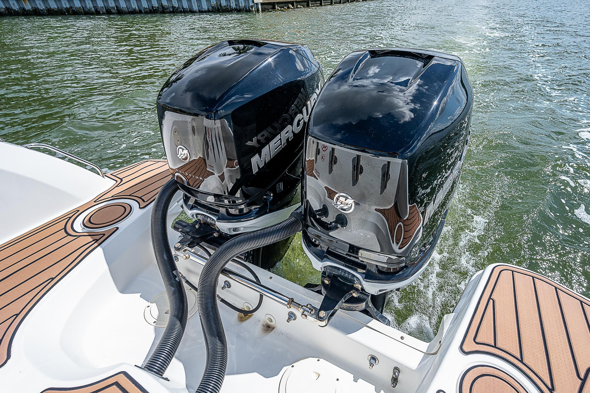 2018 Boston Whaler 270 Vantage with dual Mercury outboard engines on water.