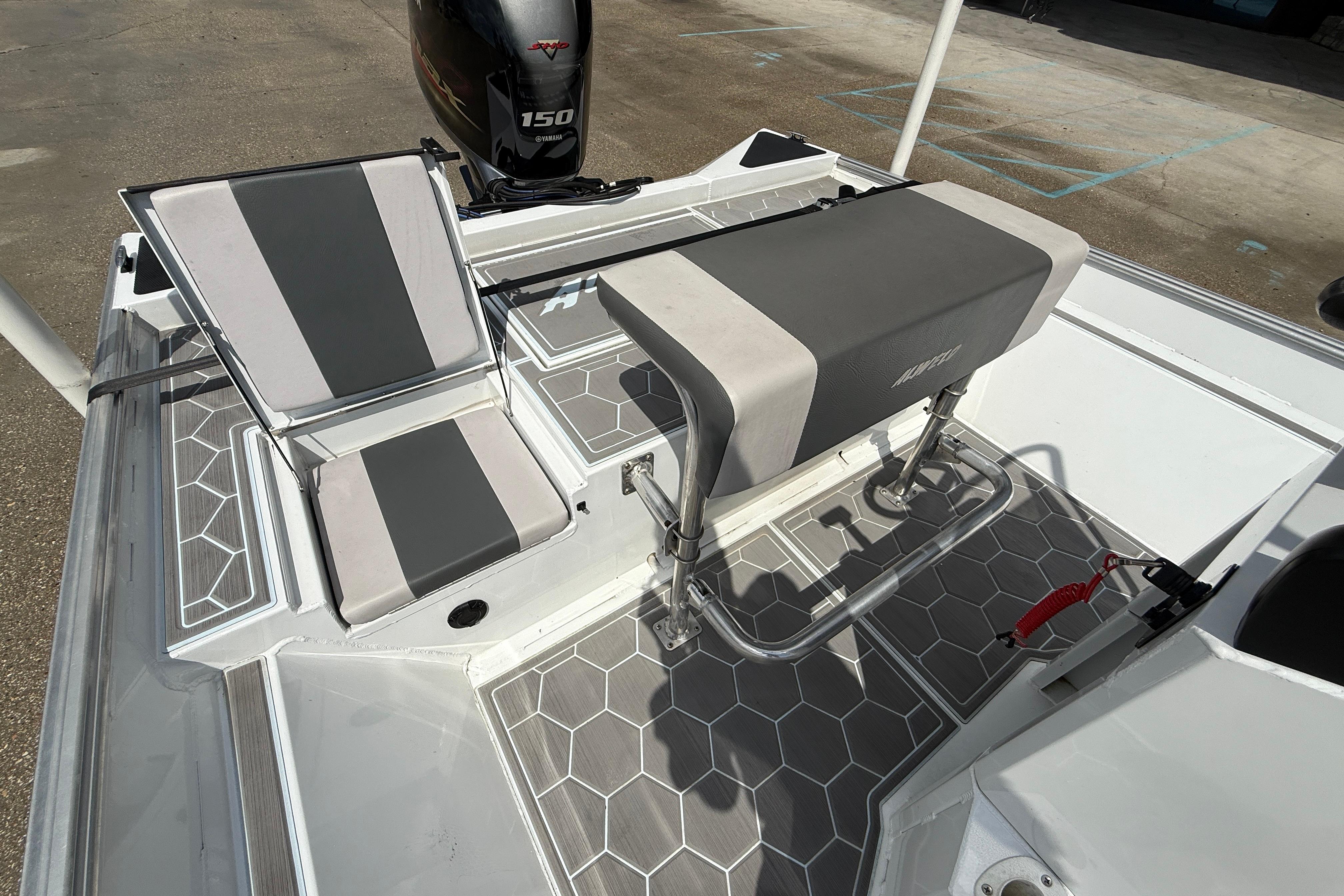 2024 Alweld 2070cc boat interior with seating and Yamaha 150 engine.