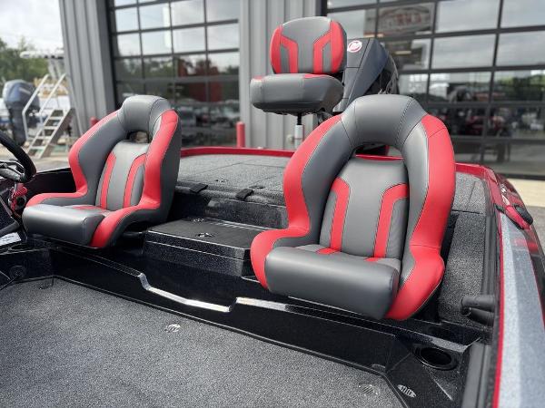 2025 Nitro Z19 Pro boat seats, red and gray design, in a showroom setting.