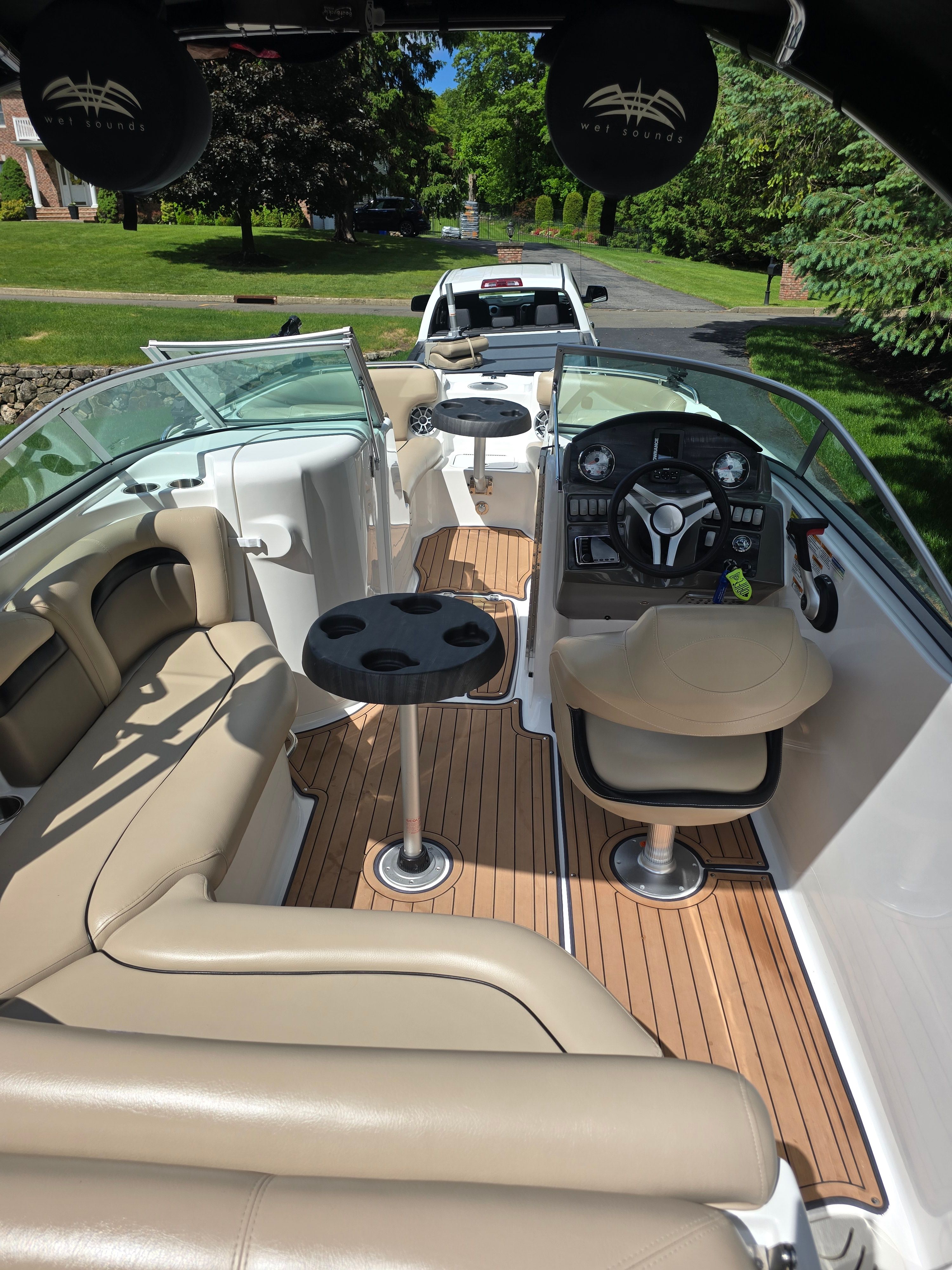 Interior of a 2016 Hurricane SD 2200 boat with beige seating.