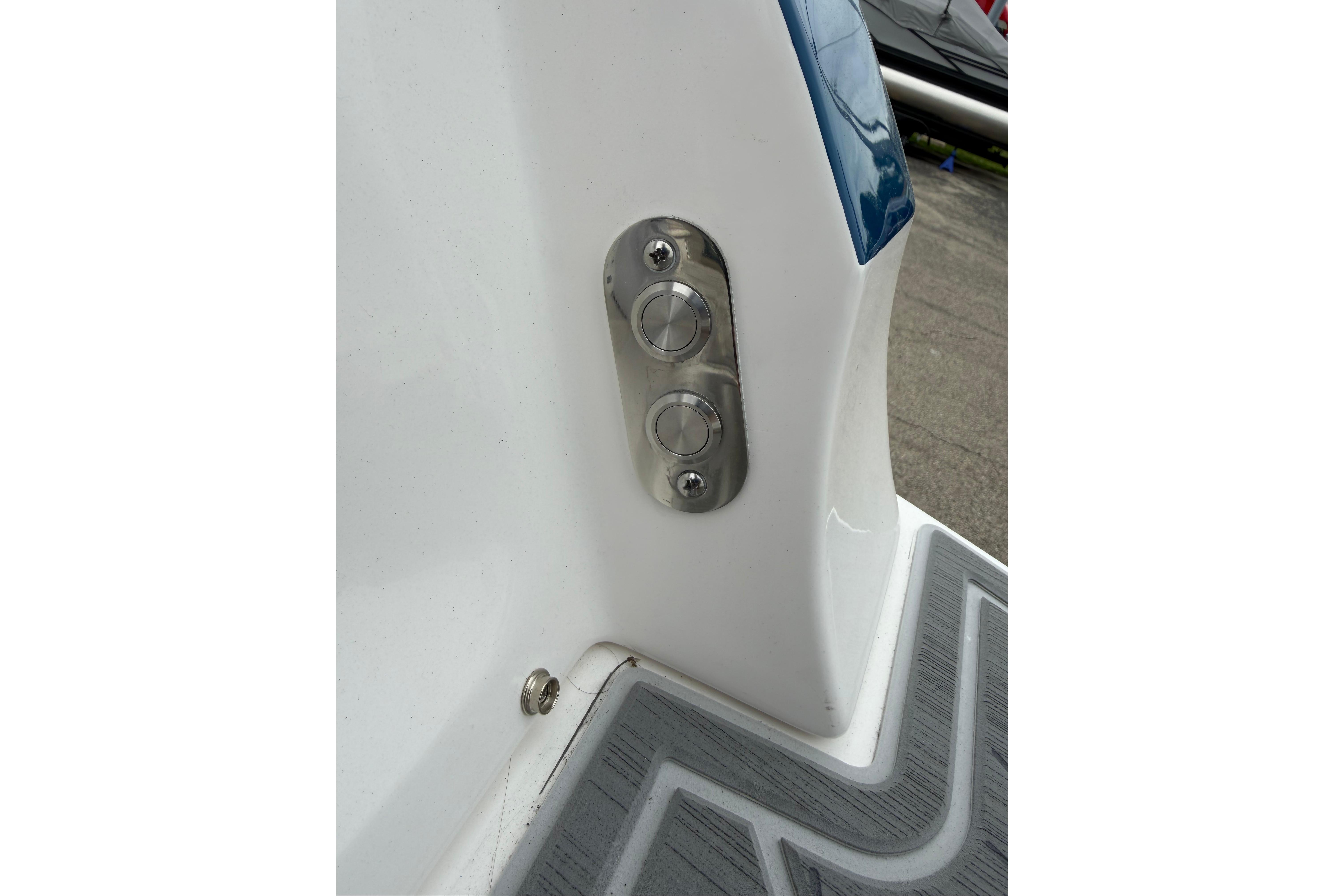 2026 Regal LS9 Surf boat detail with stainless steel fittings and textured flooring.