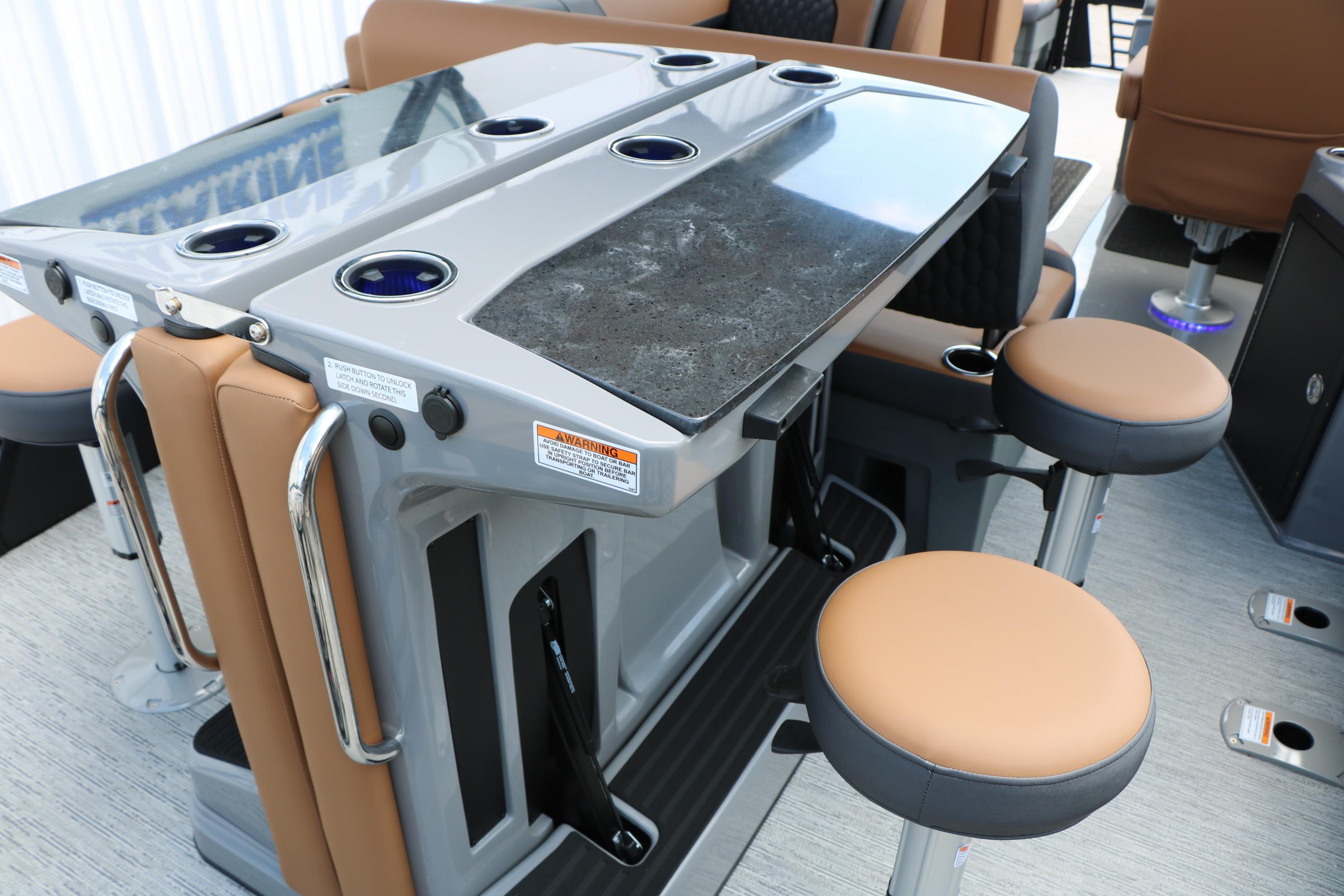 Luxurious bar seating on 2026 Sylvan L3 DLZ Bar Platinum Edition Tri-Toon boat.