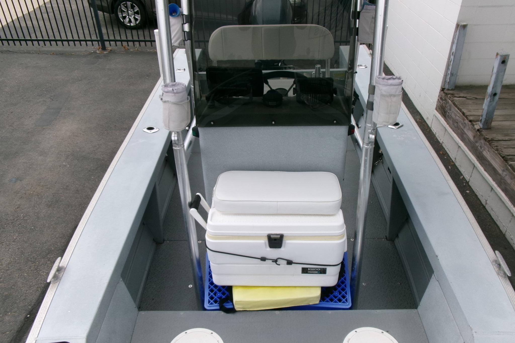 2017 Klamath Bayrunner 19 Baja boat interior with cooler and seating.