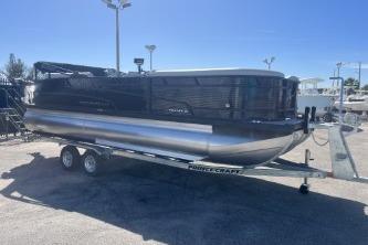 2026 Princecraft Vectra 23 L pontoon boat on a trailer under clear blue sky.