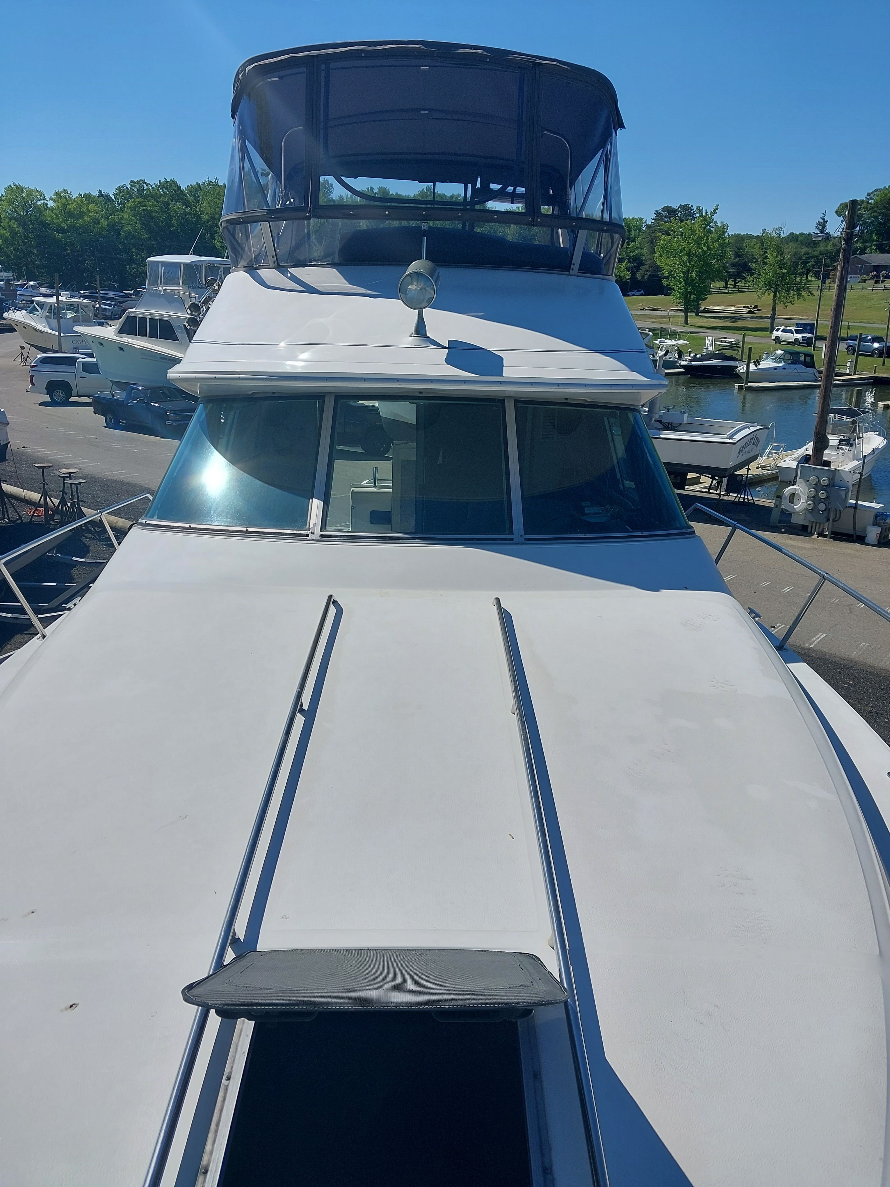 1991 Sea Ray 370 Sedan Bridge at dock, sunny day.