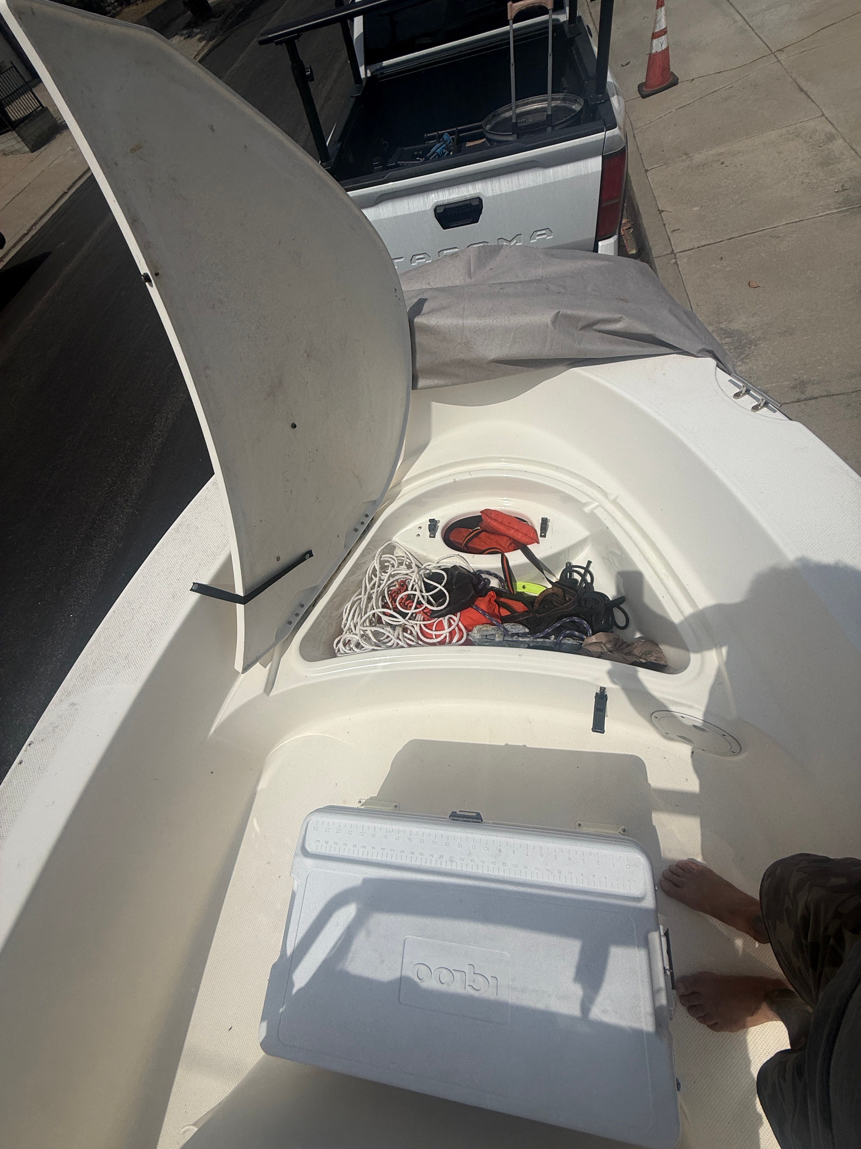 Open storage compartment on a 2008 Trophy 1703 Center Console boat.