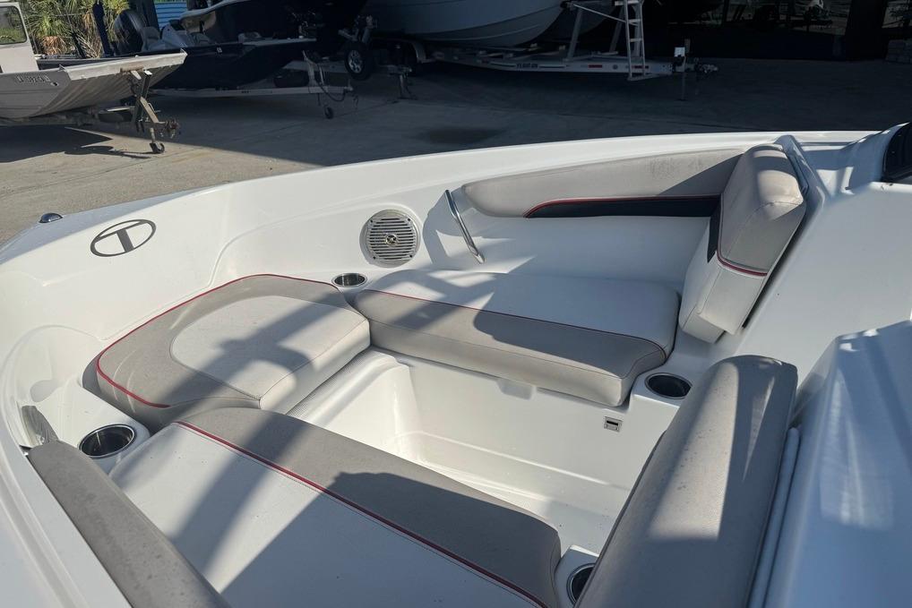 Interior of a 2018 Tahoe 700 TF boat with cushioned seating.