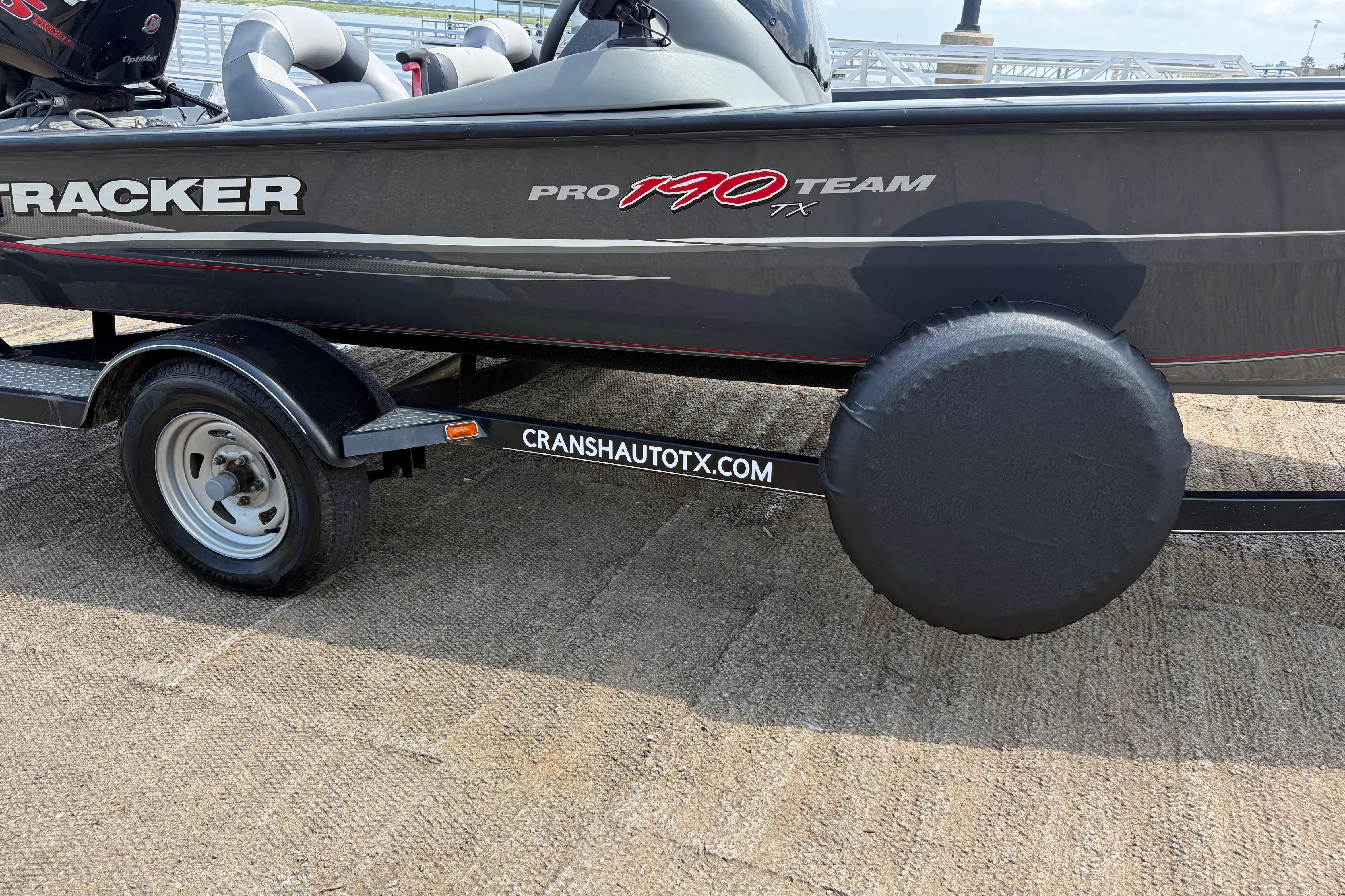 2015 Tracker Pro Team 190 TX boat on trailer with covered spare tire.