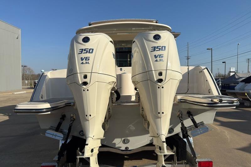 2025 Grady-White Freedom 325 boat with twin 350 V6 4.3L engines, rear view.