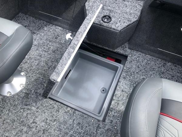 2025 Tracker Targa V18 Combo boat interior with open storage compartment.