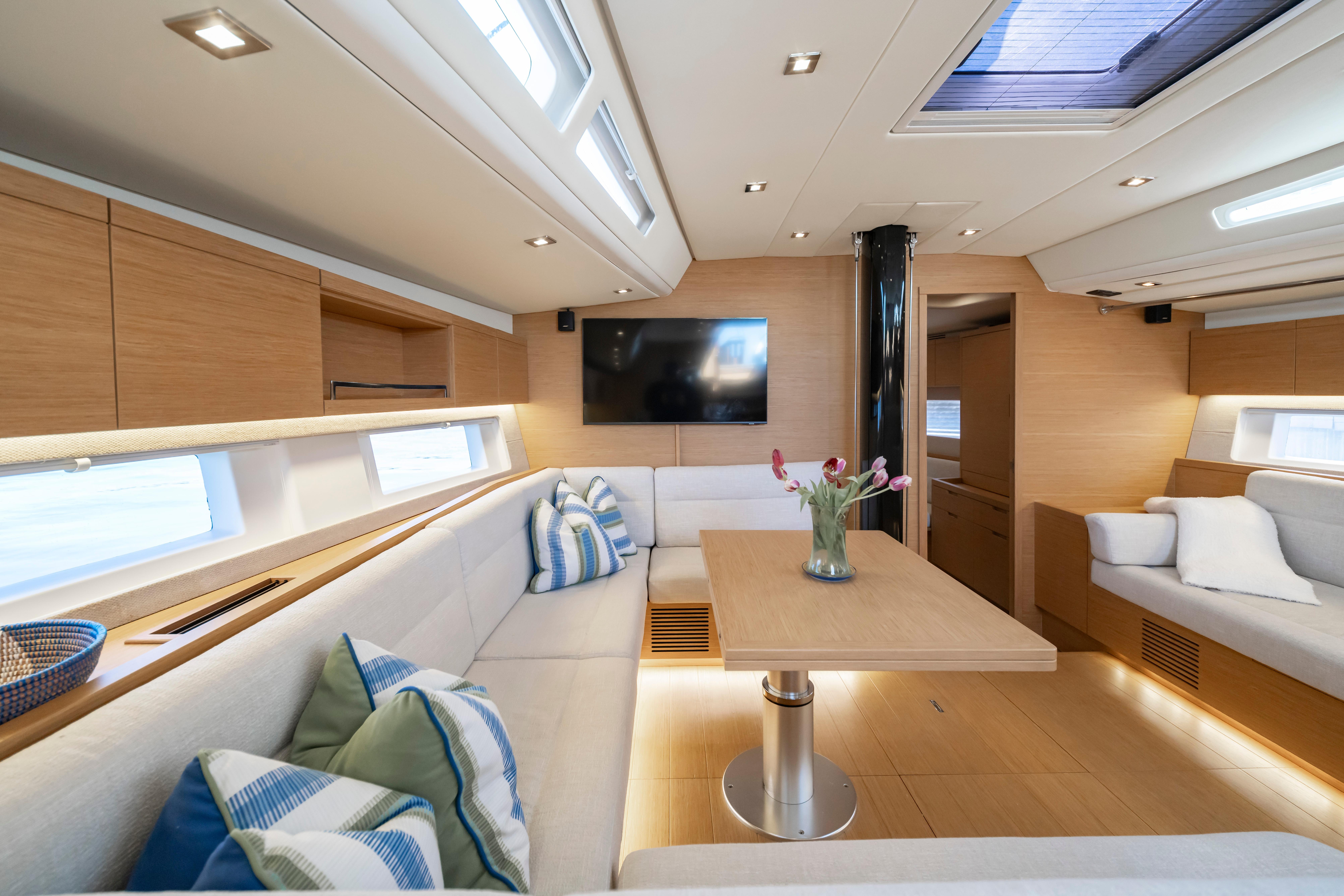 Luxurious interior of 2016 Grand Soleil 58 yacht with modern furnishings and elegant decor.
