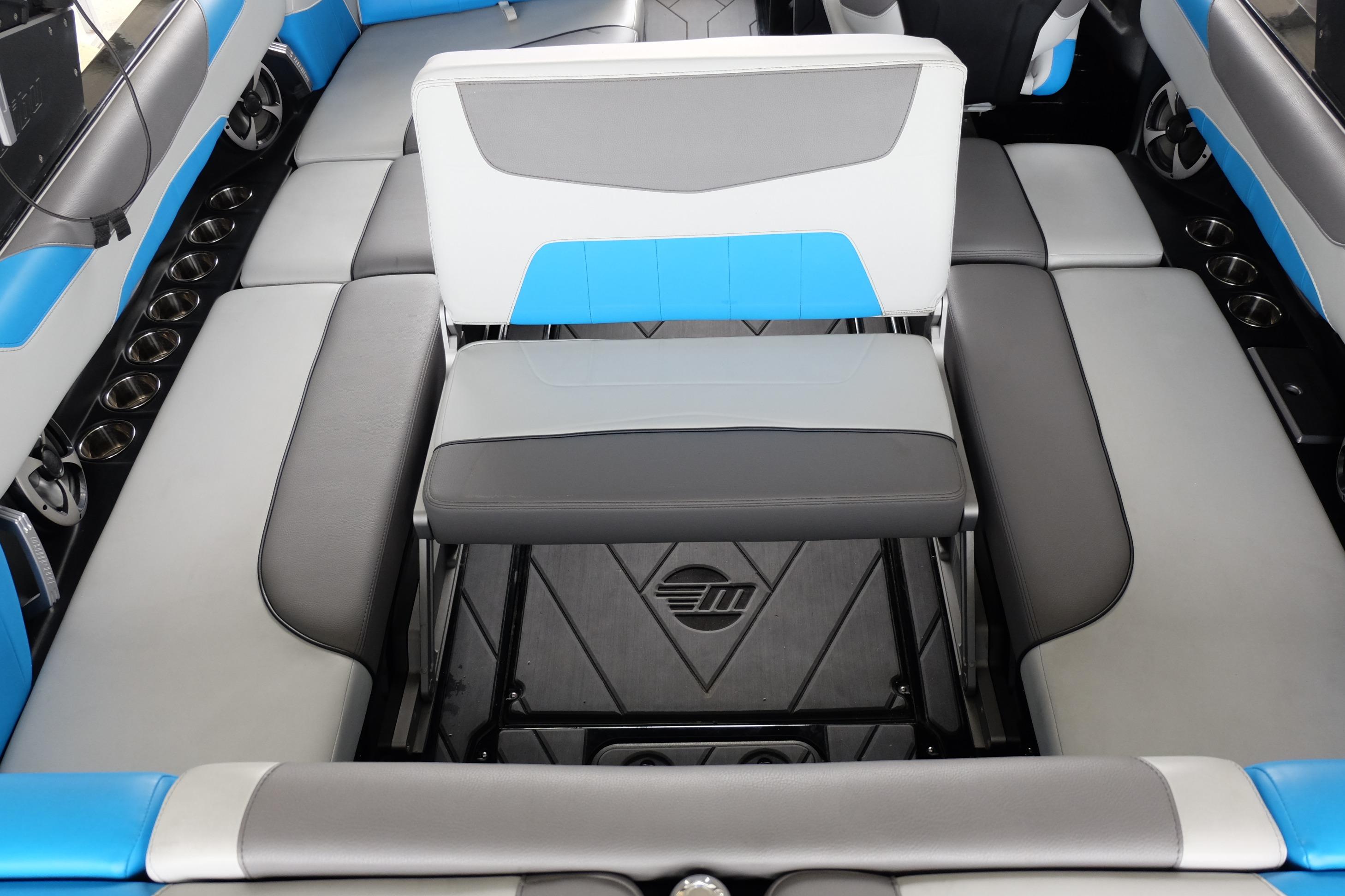 2020 Malibu Wakesetter 23 LSV interior seating with blue and gray upholstery.