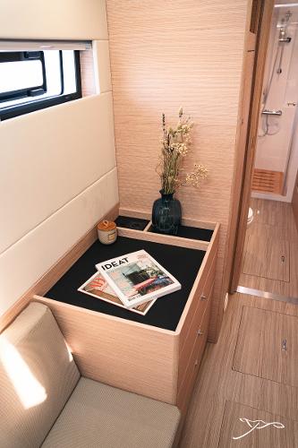 Interior of 2025 Nautitech 40 Open yacht, featuring modern decor and a cozy seating area.