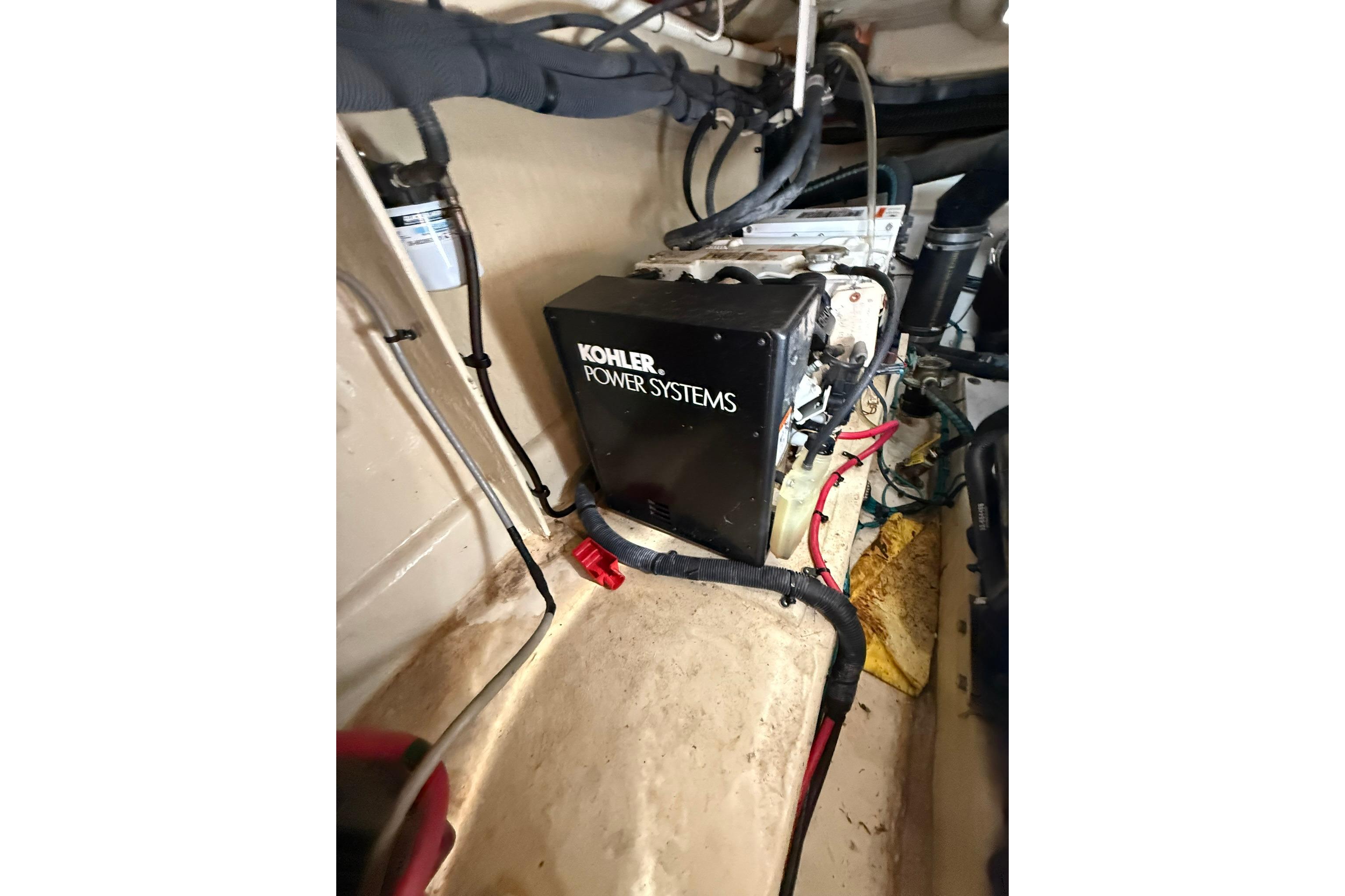 Engine room of 2009 Sea Ray 350 Sundancer with Kohler power system.
