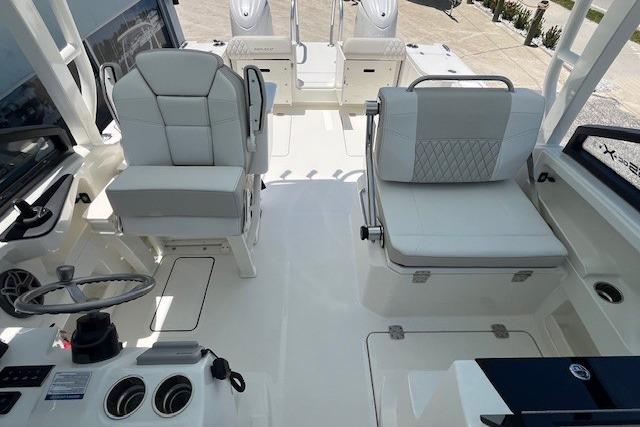2026 World Cat 265 DC-X boat interior with modern seating and steering console.