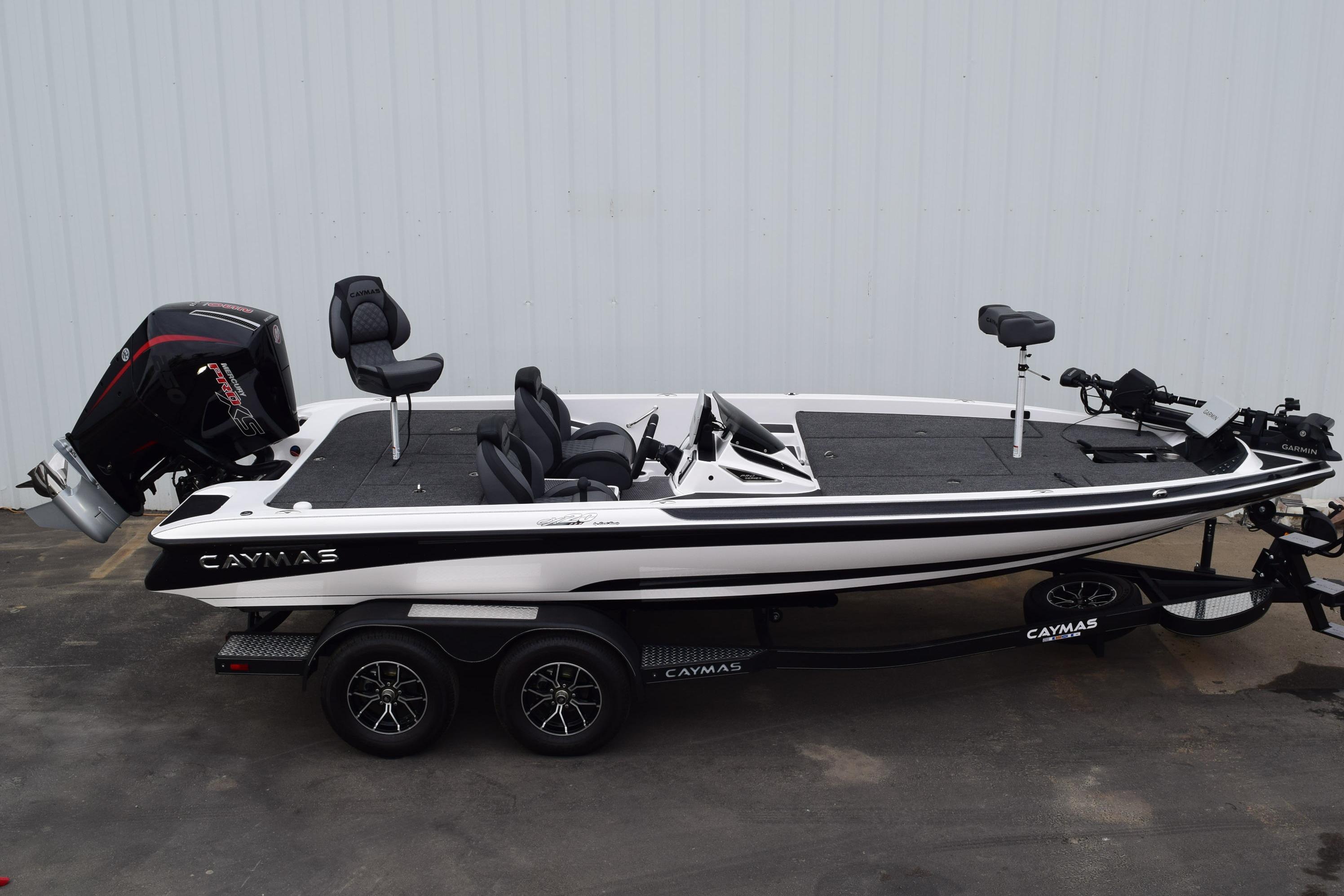 2027 Caymas CX 20 Pro fishing boat with dual seats and powerful outboard motor.