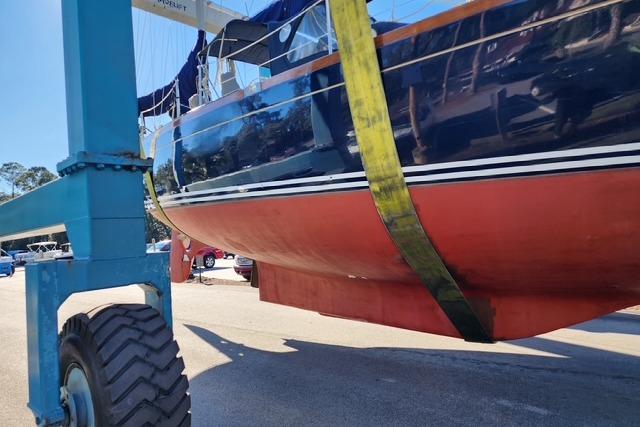 1984 Bristol 45.5 Center Cockpit sailboat in dry dock, supported by a lift.