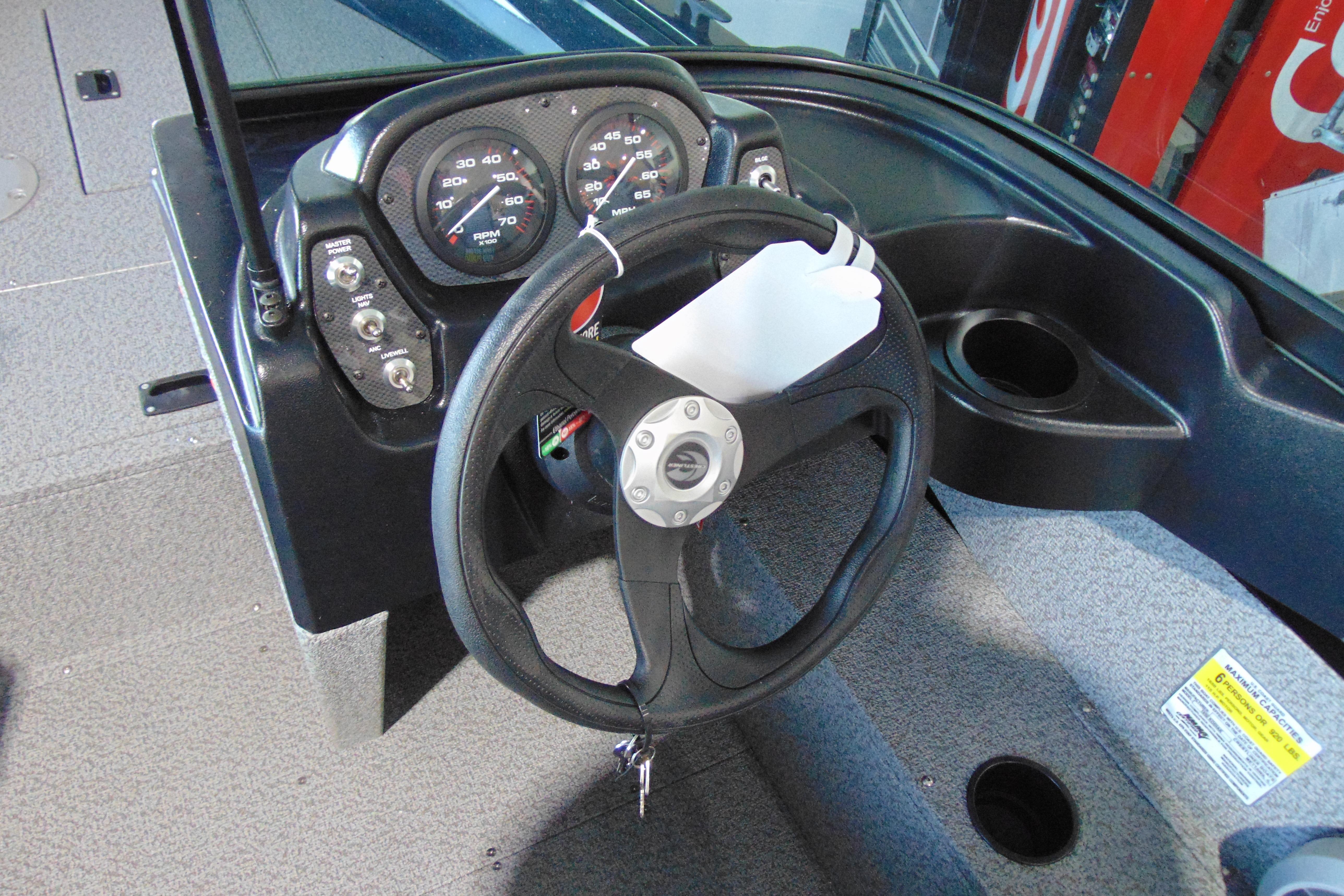 Steering console of 2026 Crestliner 1850 Kodiak WT boat with gauges and controls.