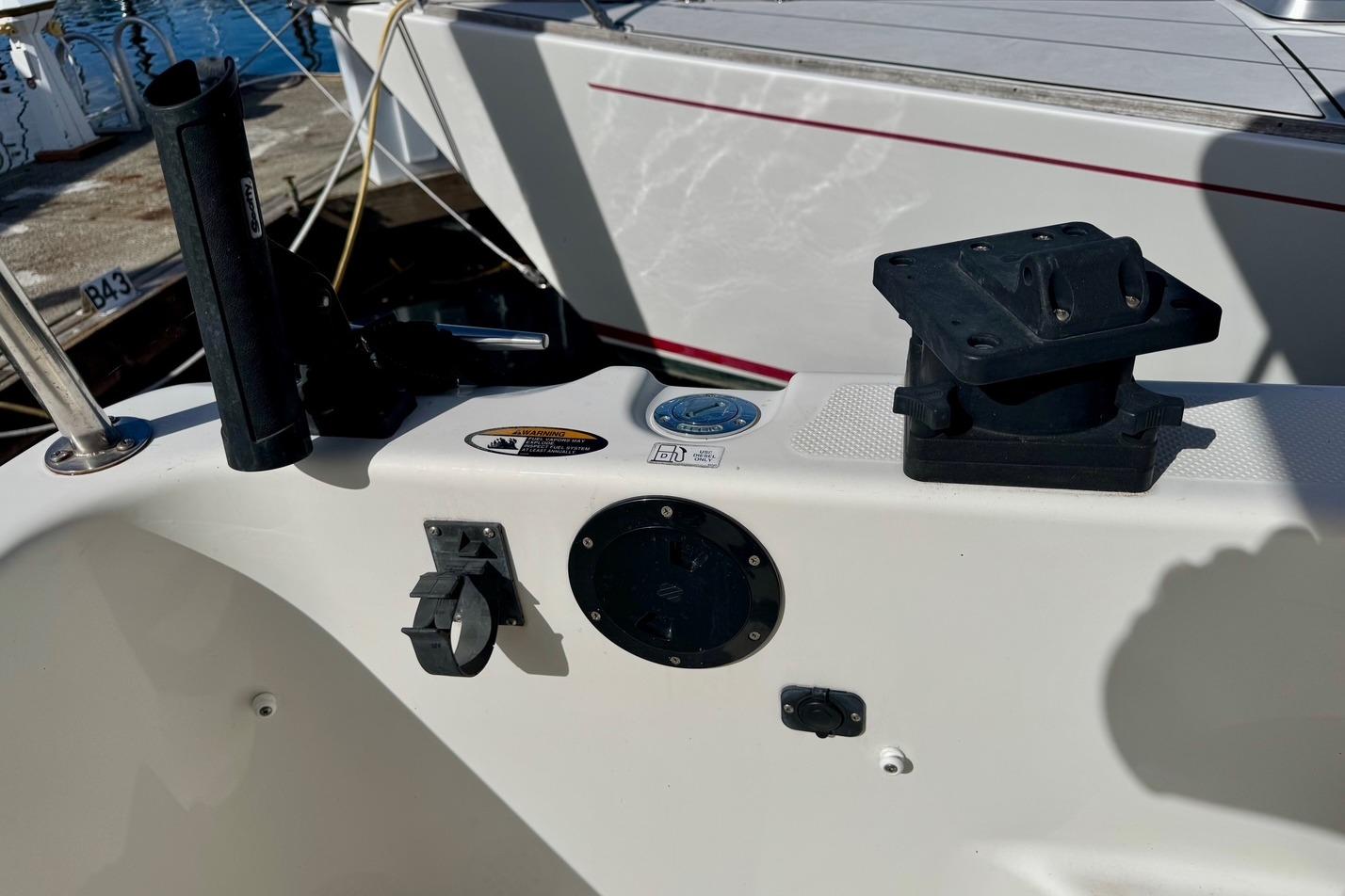1998 Bayliner 3388 Command Bridge Motoryacht deck with fishing rod holder and mount.