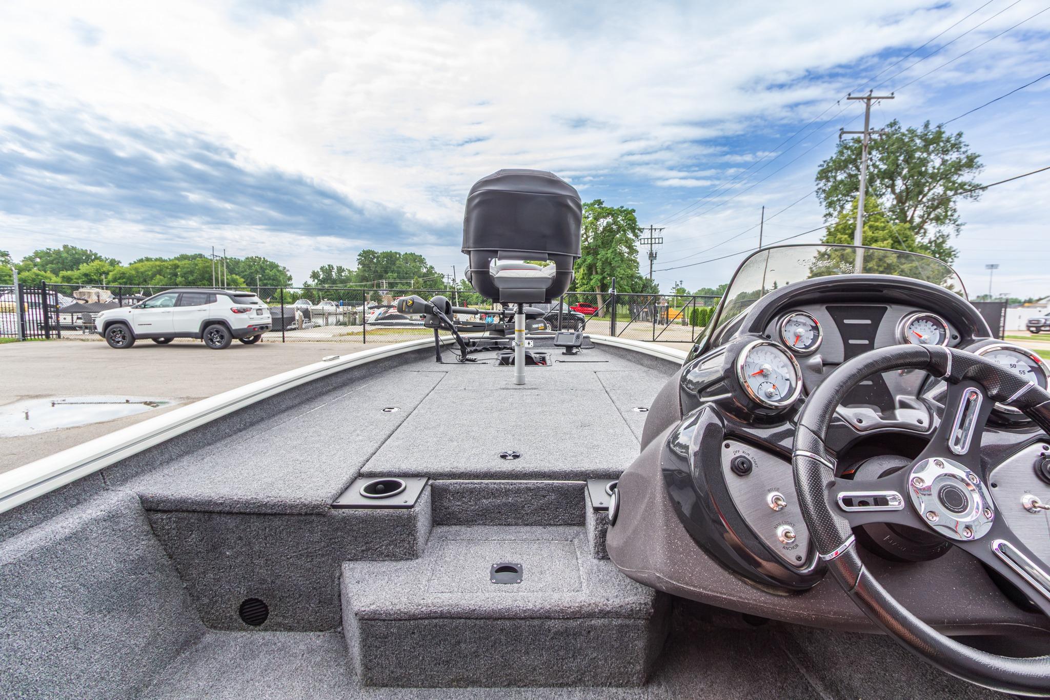 2023 Tracker Pro Team 190 TX boat interior with steering wheel and dashboard gauges.