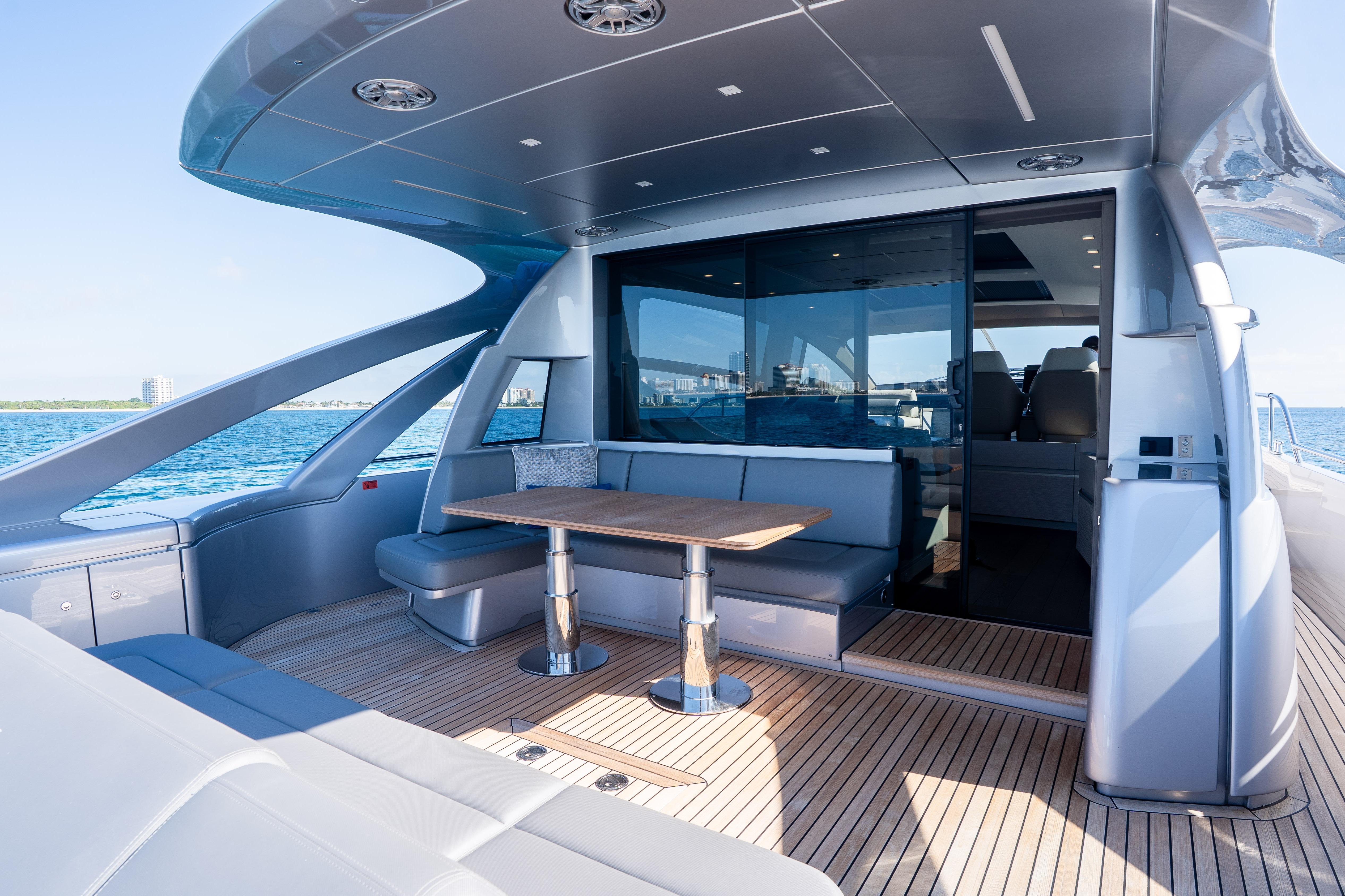 2024 Pershing 7X yacht deck with sleek seating and ocean view.