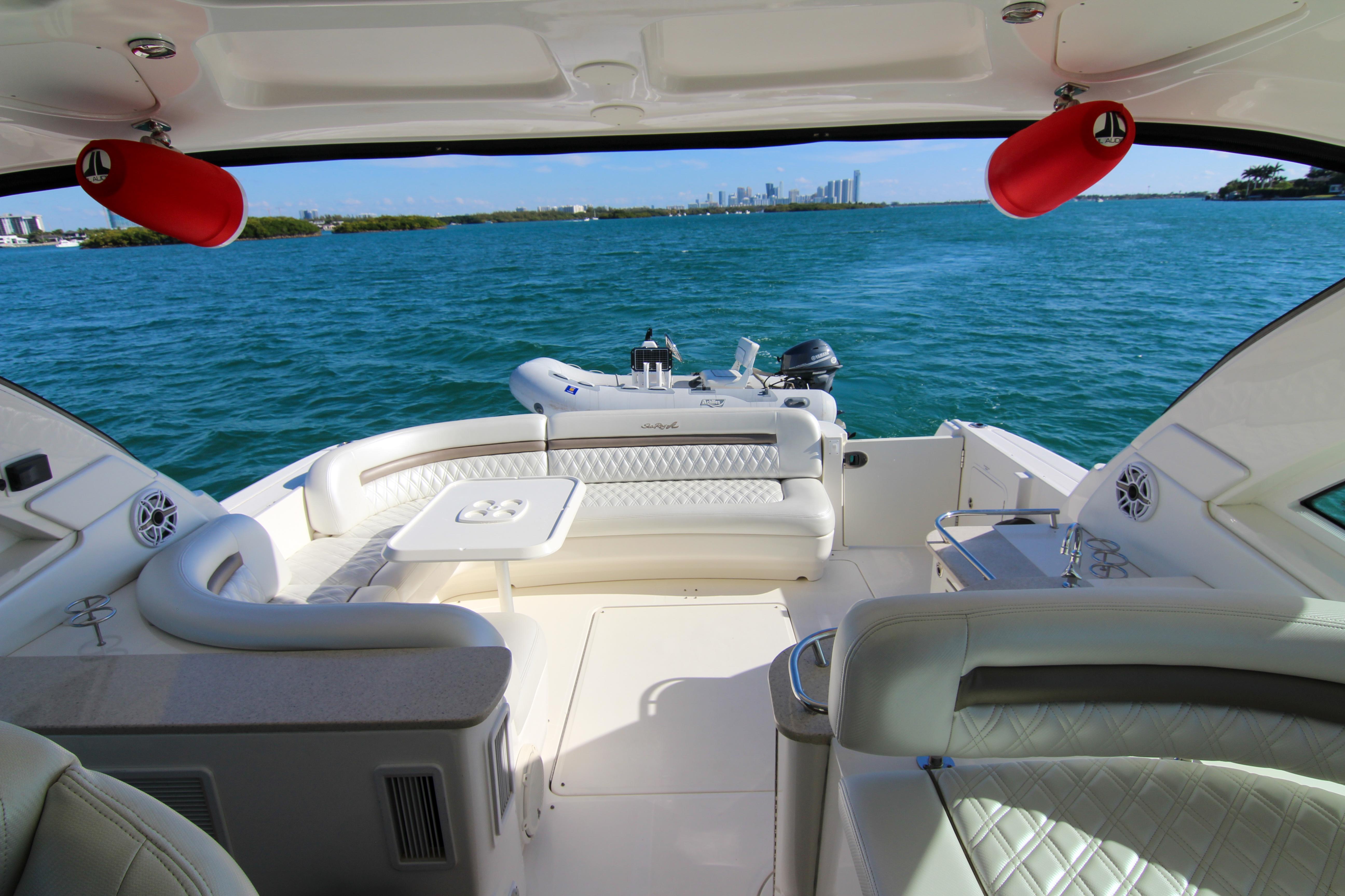 2008 Sea Ray 48 Sundancer yacht interior with plush seating, overlooking serene blue waters.