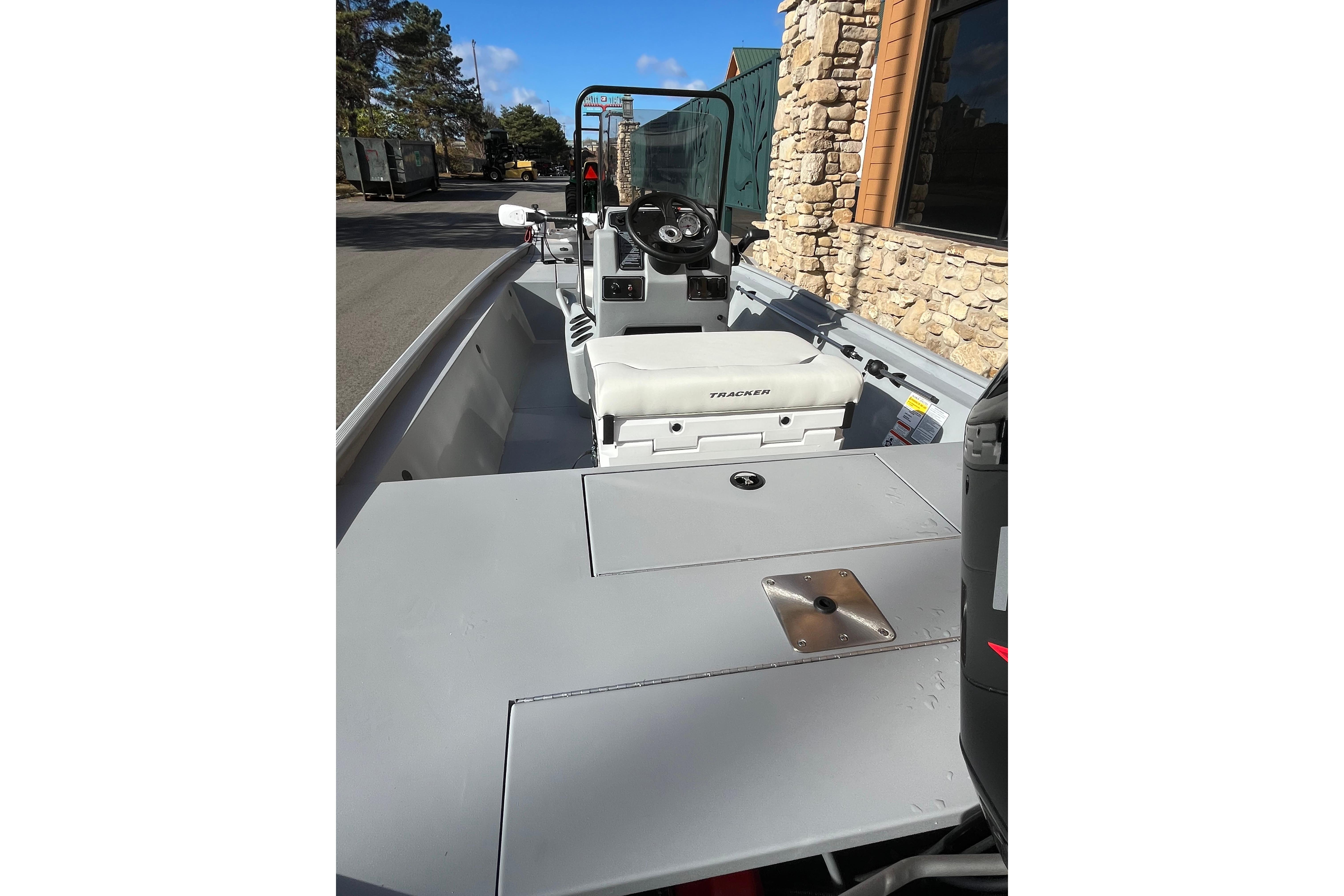 2026 Tracker Bass Tracker Classic CC boat interior with steering console and seating.