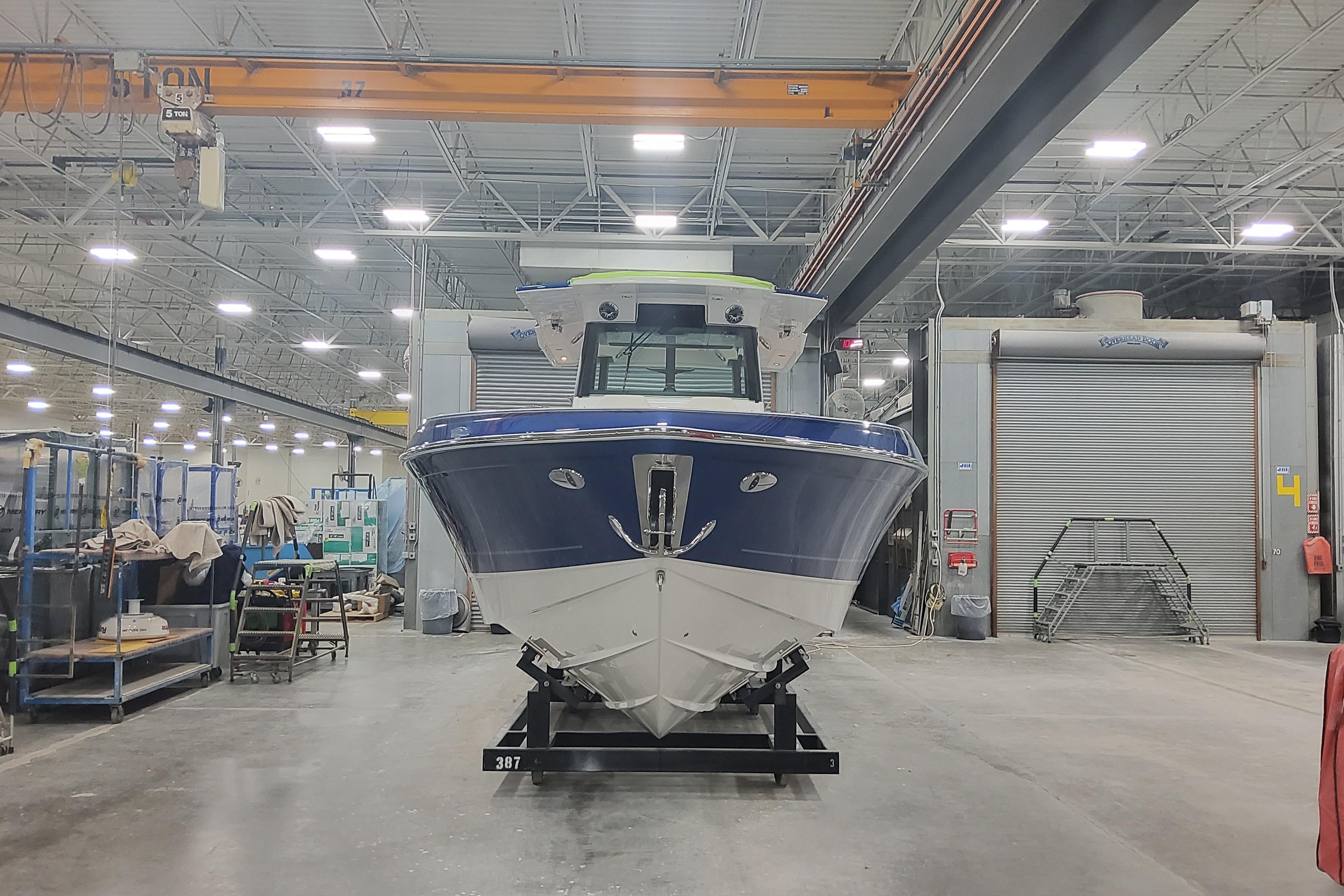 2024 Formula 387 Center Console Fish boat in a manufacturing facility.