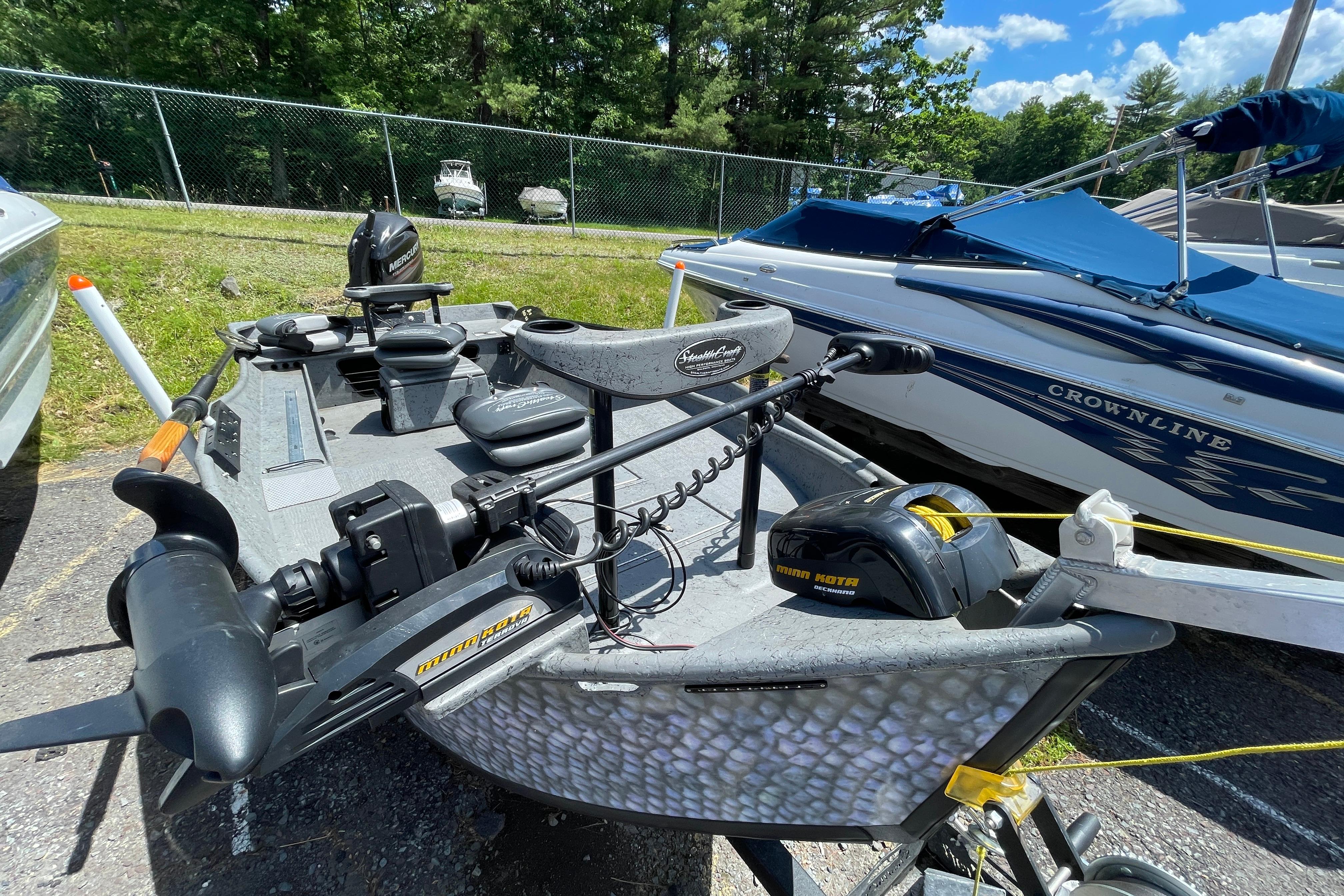 2018 StealthCraft 16 Power Drifter boat with Minn Kota motor in outdoor setting.