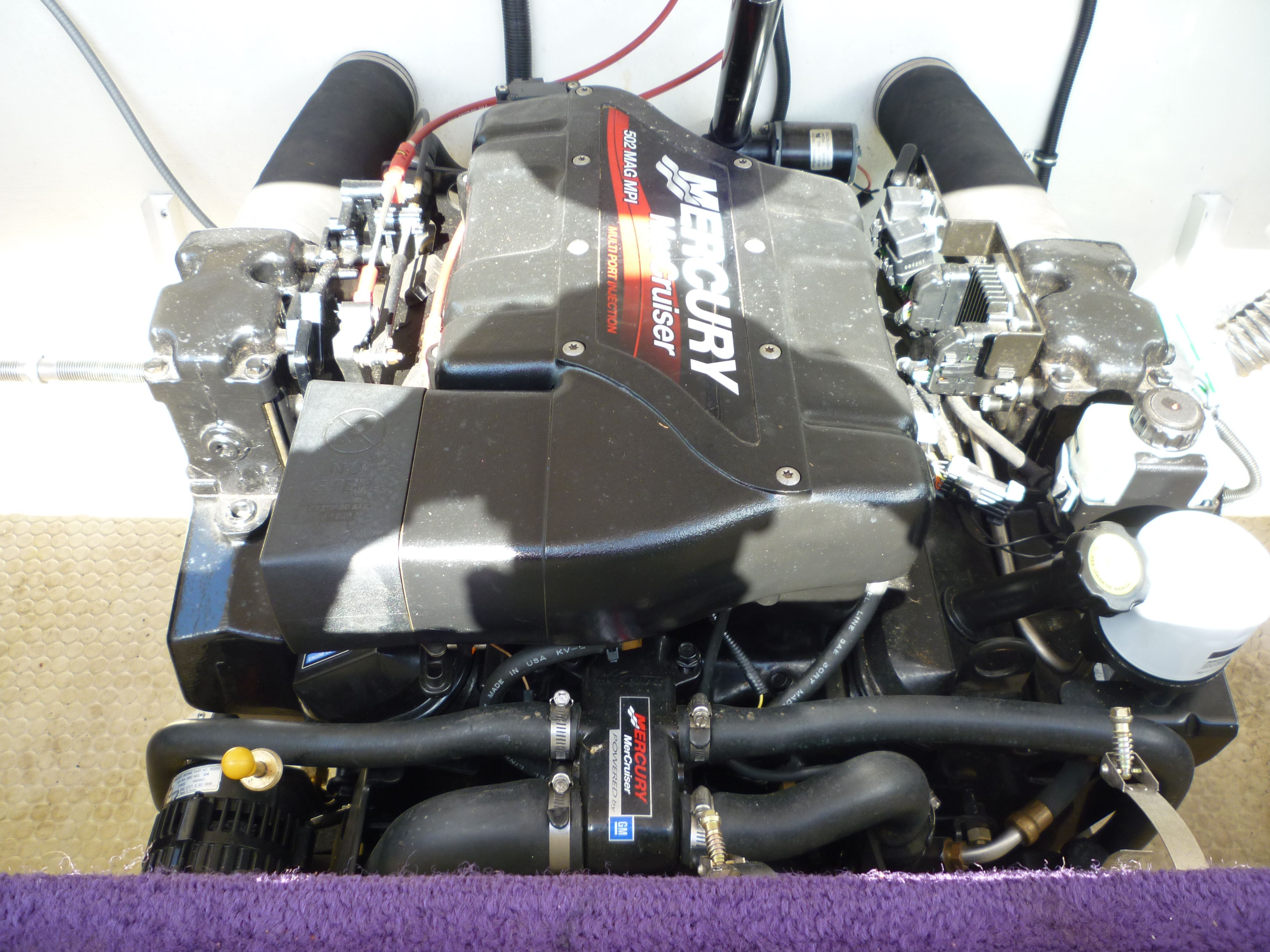 Mercury MerCruiser engine in a 2000 Velocity 280 boat, showcasing detailed components.