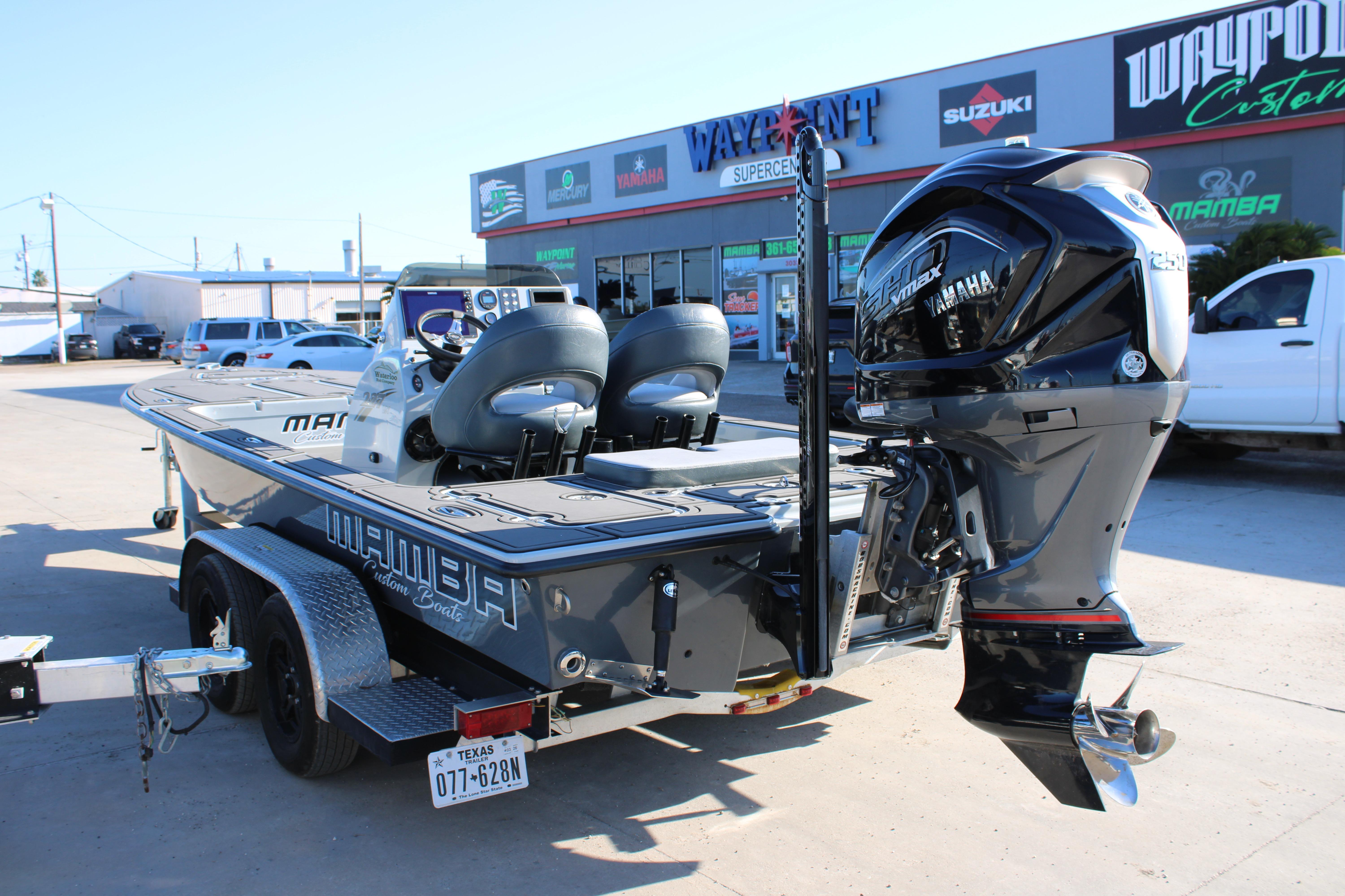 2025 Mamba 227VX boat with Yamaha engine at dealership parking lot.