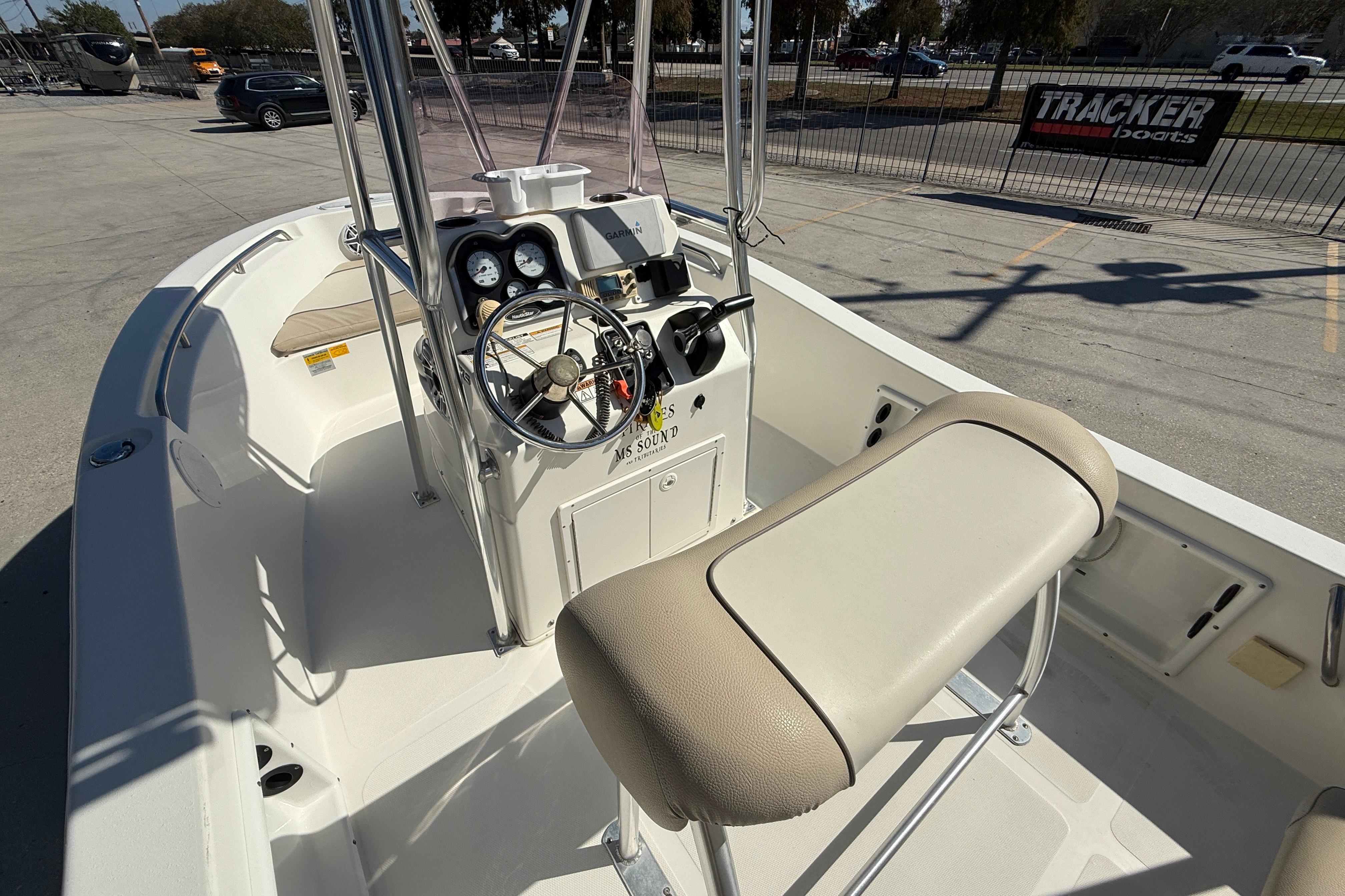 2019 NauticStar 19 XS boat interior with steering console and seating.