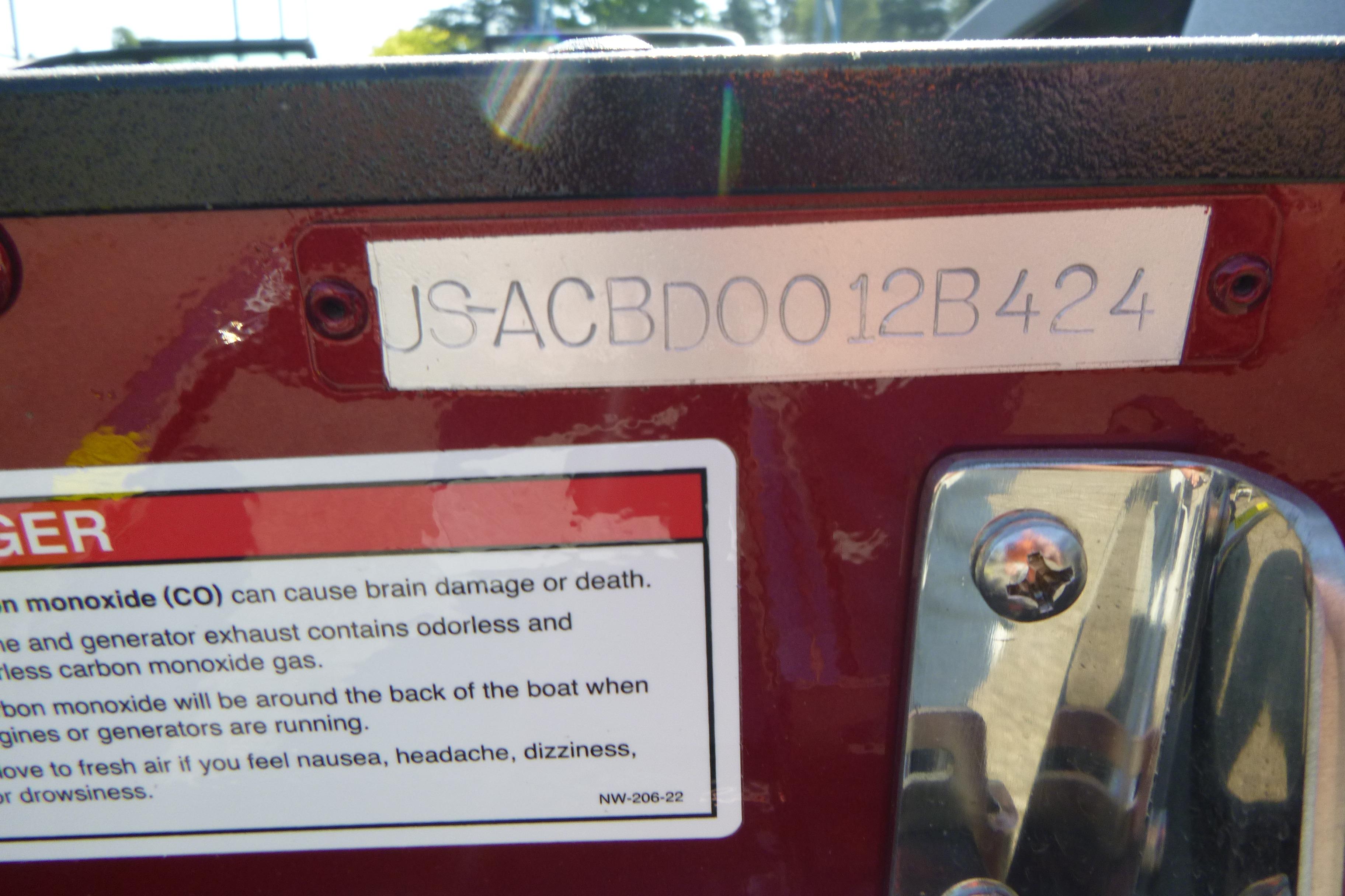 2024 Alumacraft Competitor 185X Sport boat identification number and safety warning label.